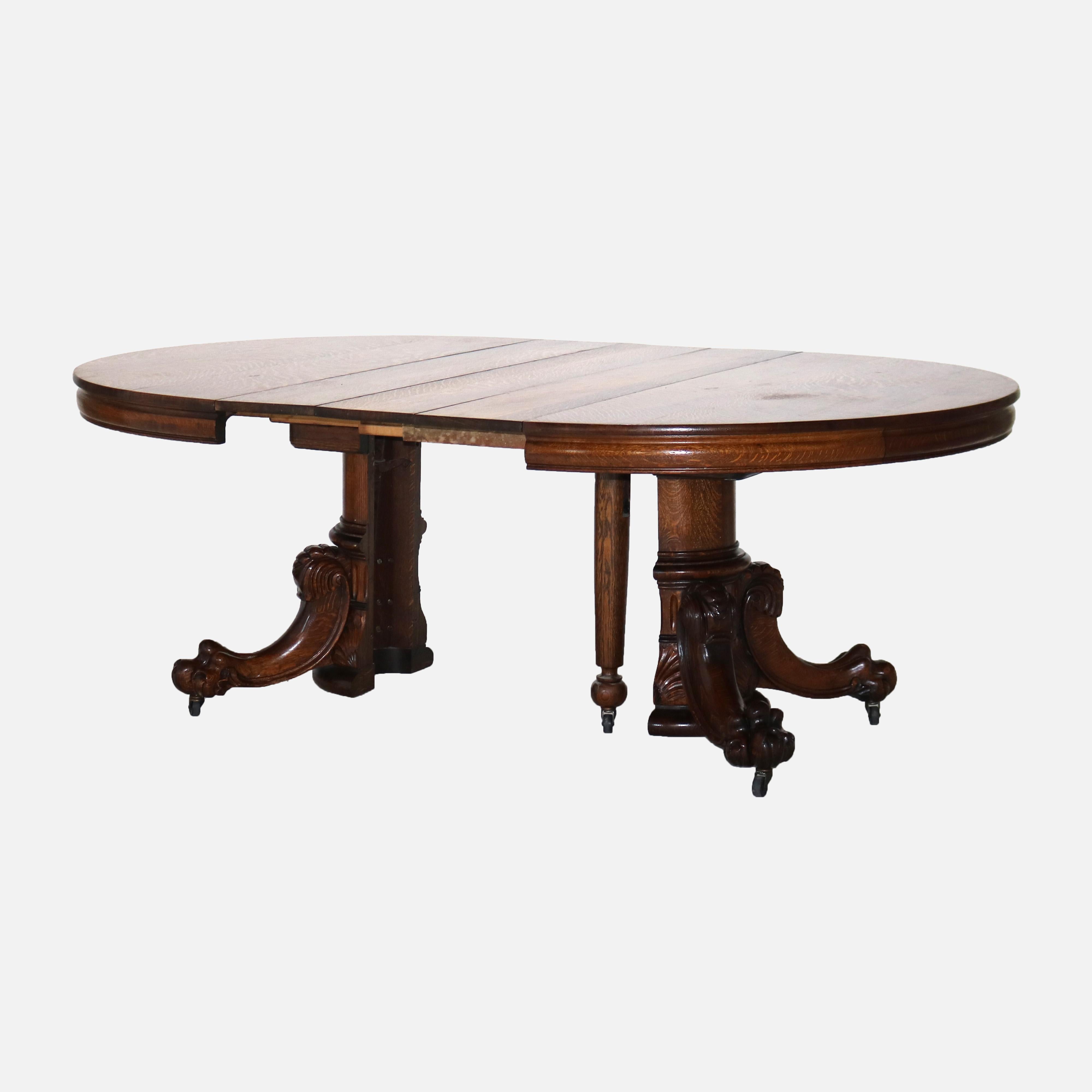 20th Century Antique Hastings Carved Oak Clawfoot Dining Table with Three Leaves C1910