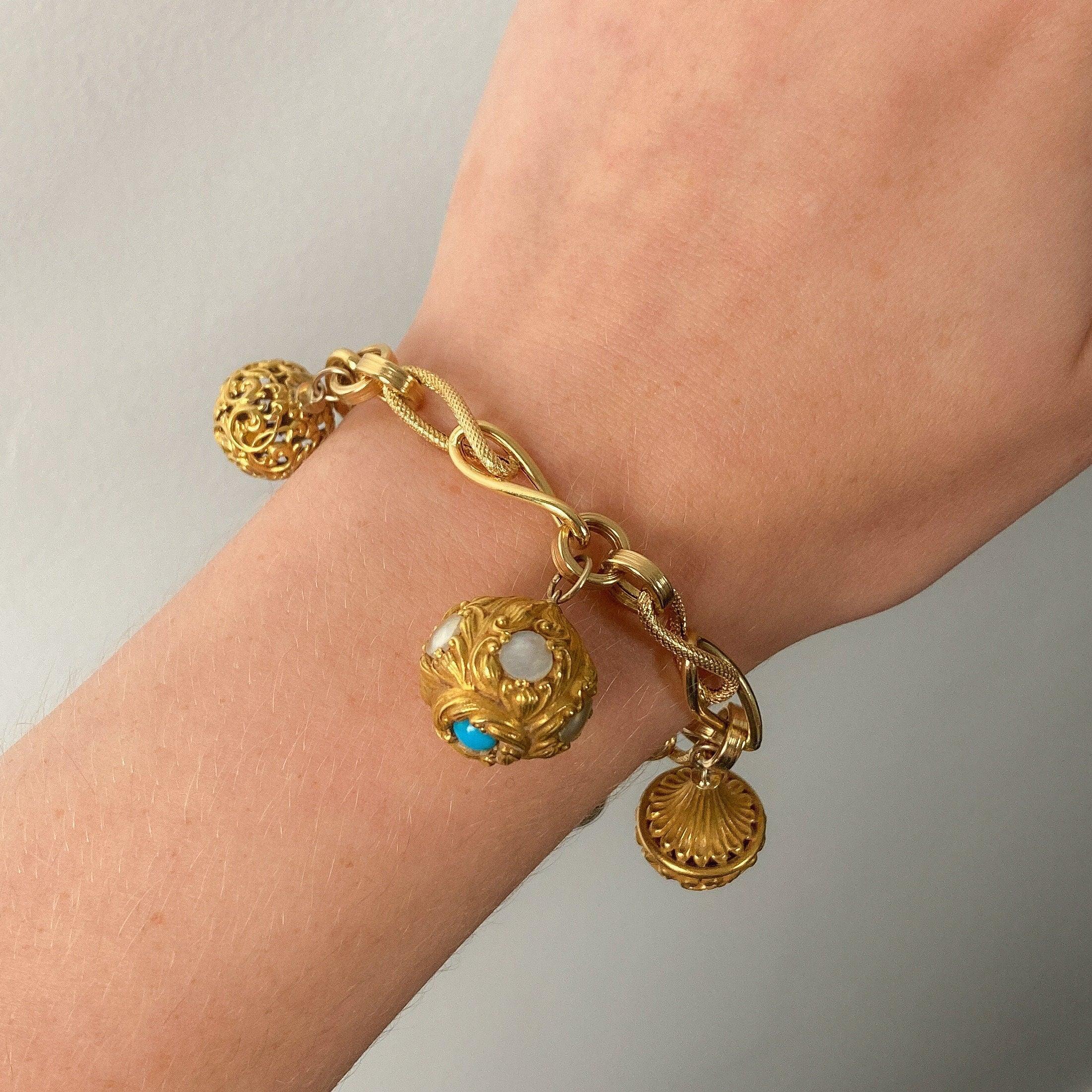 Donna Bracciale Charme Antiques in oro 14 e 18 ct.