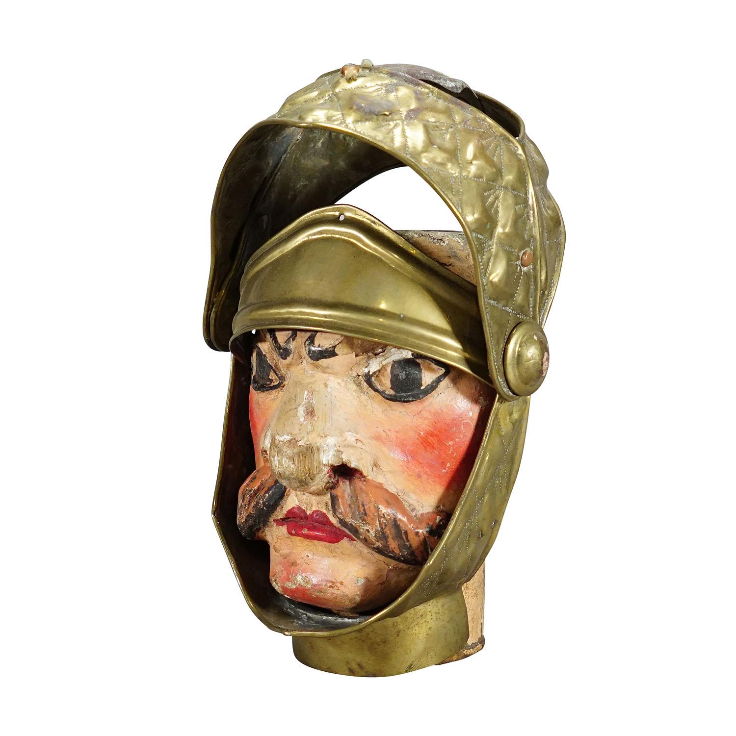 Antique Head of a Sicilian puppet, ca. 1900s

Antique Head of a Sicilian puppet depicting a knight. Made of handcarved and handpainted wood with handforged metal helmet. Manufactured in Sicilli late 19th century.

Measures:
Width: 6.69