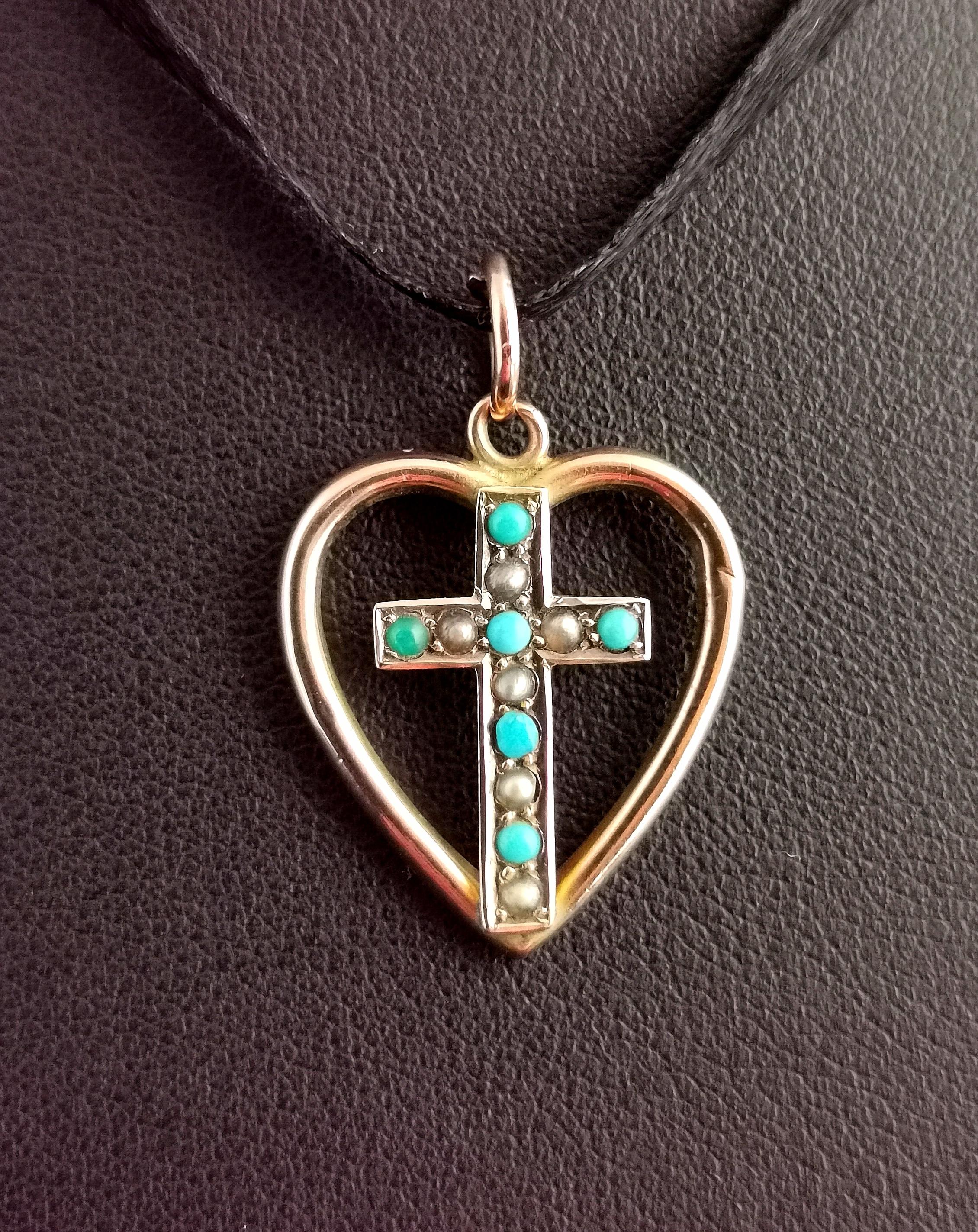 A sweet little antique heart and cross pendant in 9kt Rose gold.

It is a very pretty piece featuring a hollow openwork heart with a cross in the centre of the heart.

The cross is set with turquoise and seed pearl cabochons and the pendant has a