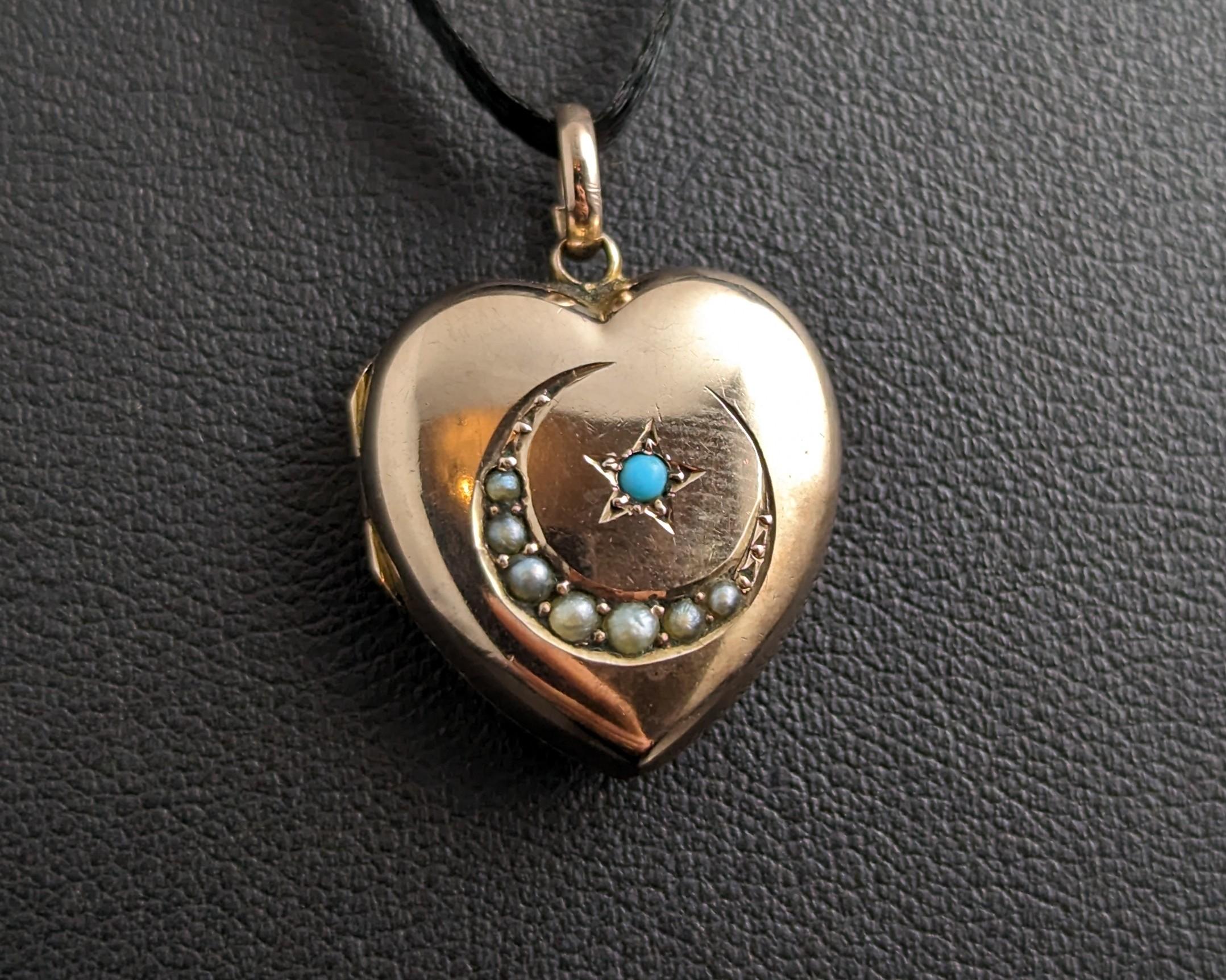 This sweet antique heart shaped locket is so enchanting with it's pretty celestial twist.

This locket is 9kt gold front and back and the front has a little seed pearl adorned crescent moon with a tiny turquoise star set.

Such a pretty little