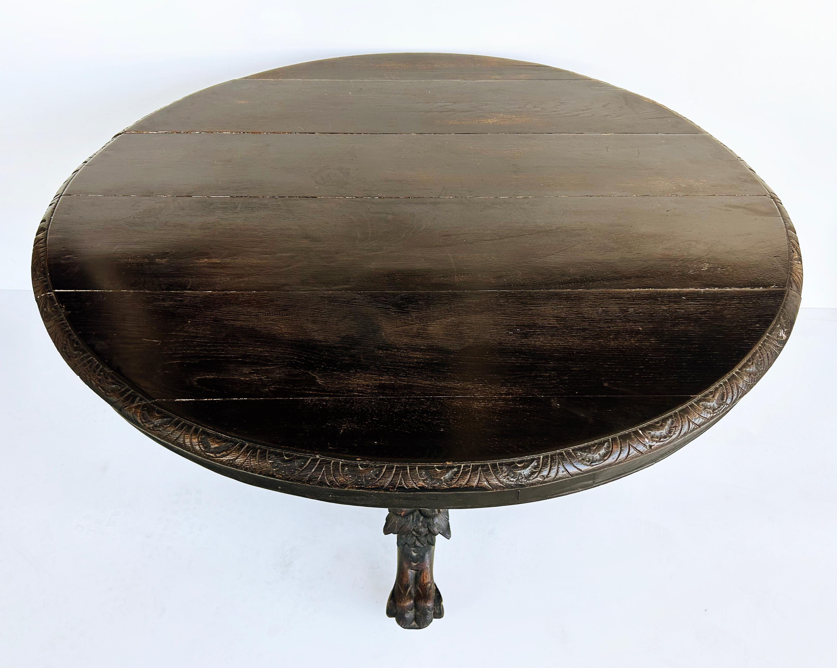 Hand-Carved Antique Heavily Carved Griffins Wood Center, Game Table on Casters For Sale