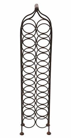 Antique heavy wrought iron wine rack C1920 or earlier 16 bottles stand