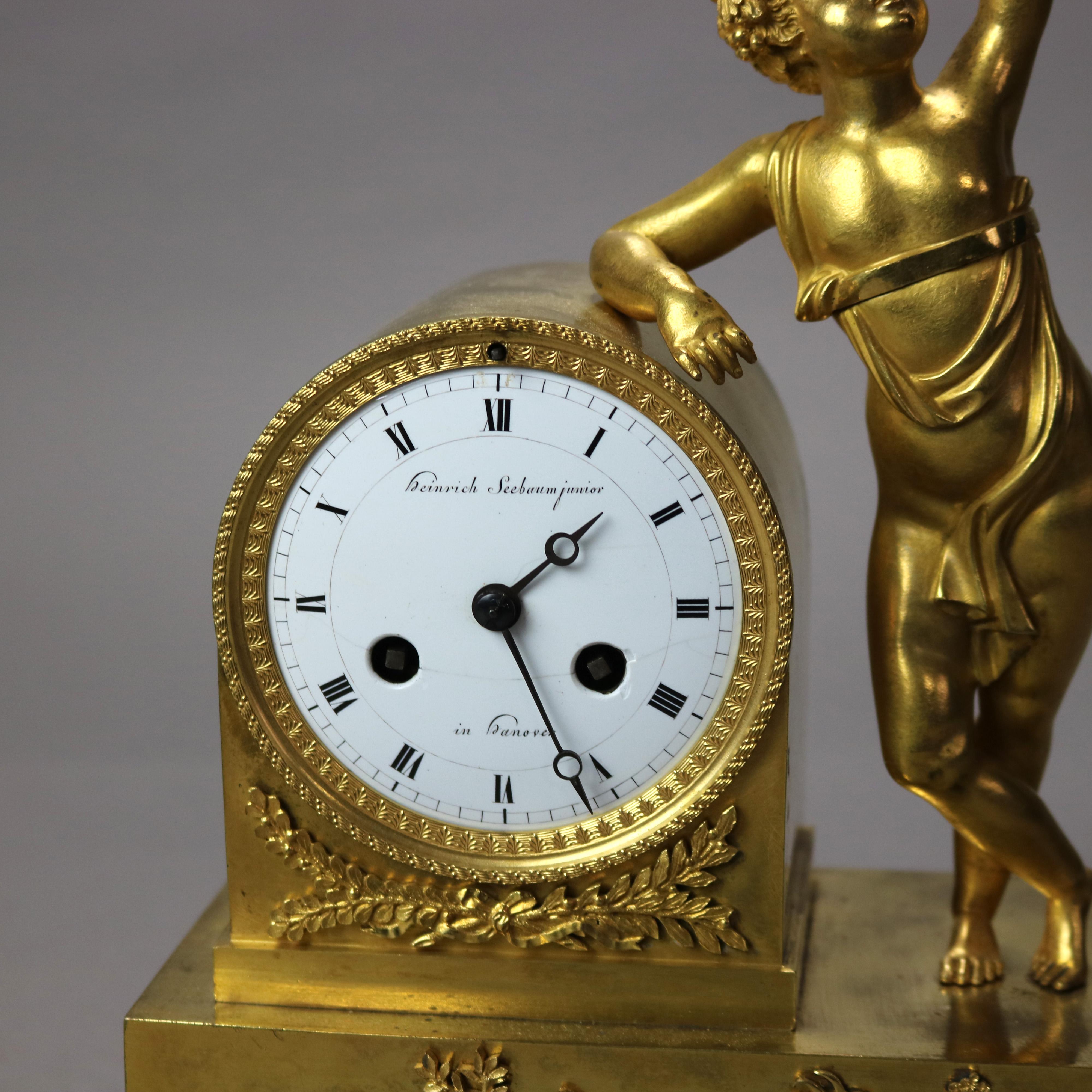 Antique Heinrich Seebaum Junior French Empire Figural Gilt Bronze Clock with cherub, Goat, Wine & Grapes c1830

Measures - 11 3/4