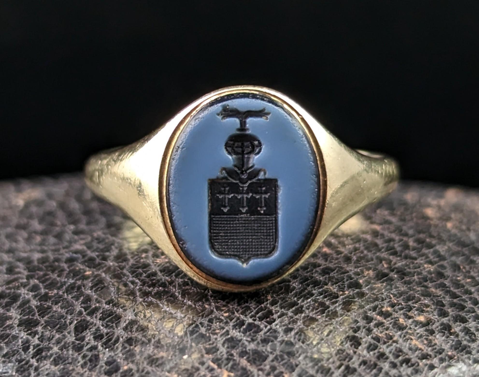 This impeccable antique, Edwardian era
9kt gold and Sardonyx signet ring has everything you could wish for in a signet ring!

It has an oval shaped face set with a black Sardonyx stone with a white overlay, this has a finely carved heraldic style