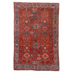 Ancien Bidjar Herati avec terrain rouge et détails bleus