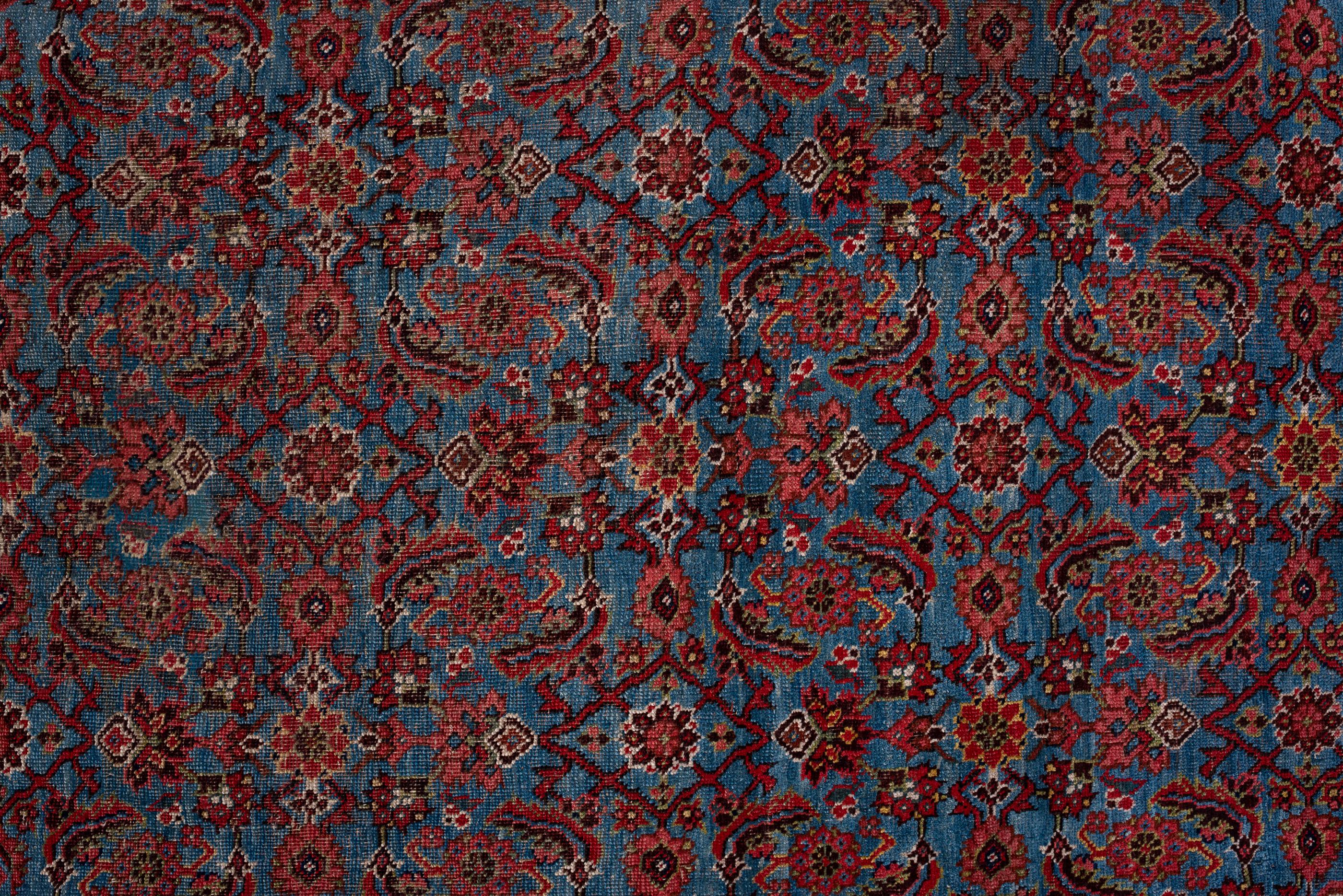 Hand-Knotted Antique Herati Design with Red Field and Navy Blue Border For Sale
