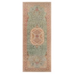 Antique Hereke Gallery Runner in Green with Floral Medallion
