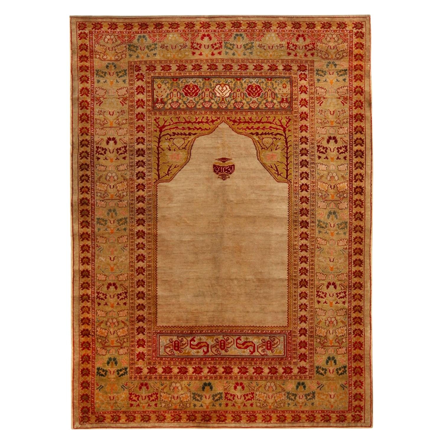 Antique Hereke Golden-Beige and Red Floral Silk Rug by Rug & Kilim For Sale