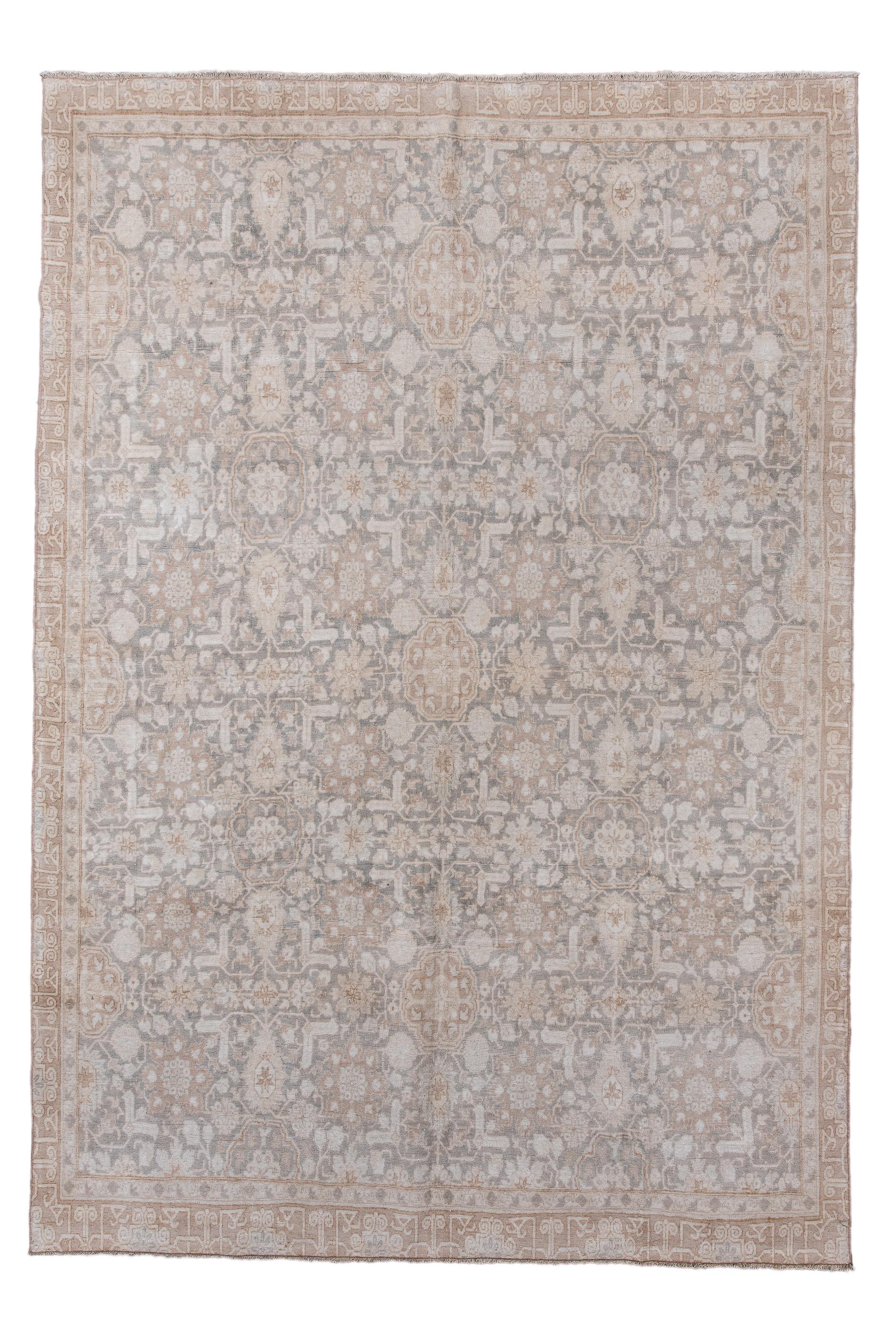 This well-woven Anatolian large scatter shows a slate field evenly overlaid by an Avshan allover design  of forked “goosenecks”, rosettes, elongated ragged palmettes,  stars, stems and florets.  Originally northern Persian, the pattern has been