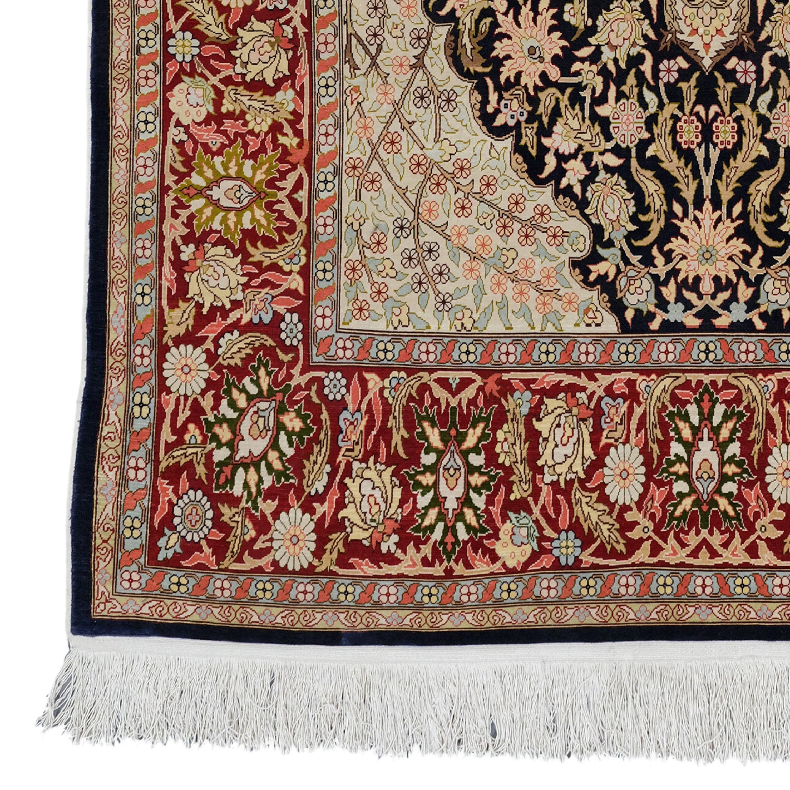 Antique Hereke Silk Rug  Antique Silk Rug
20th Century Turkish Silk Hereke Rug

This magnificent carpet will fascinate you with its intricate designs and vibrant colors that reflect the rich history and craftsmanship of the period. Each stitch tells