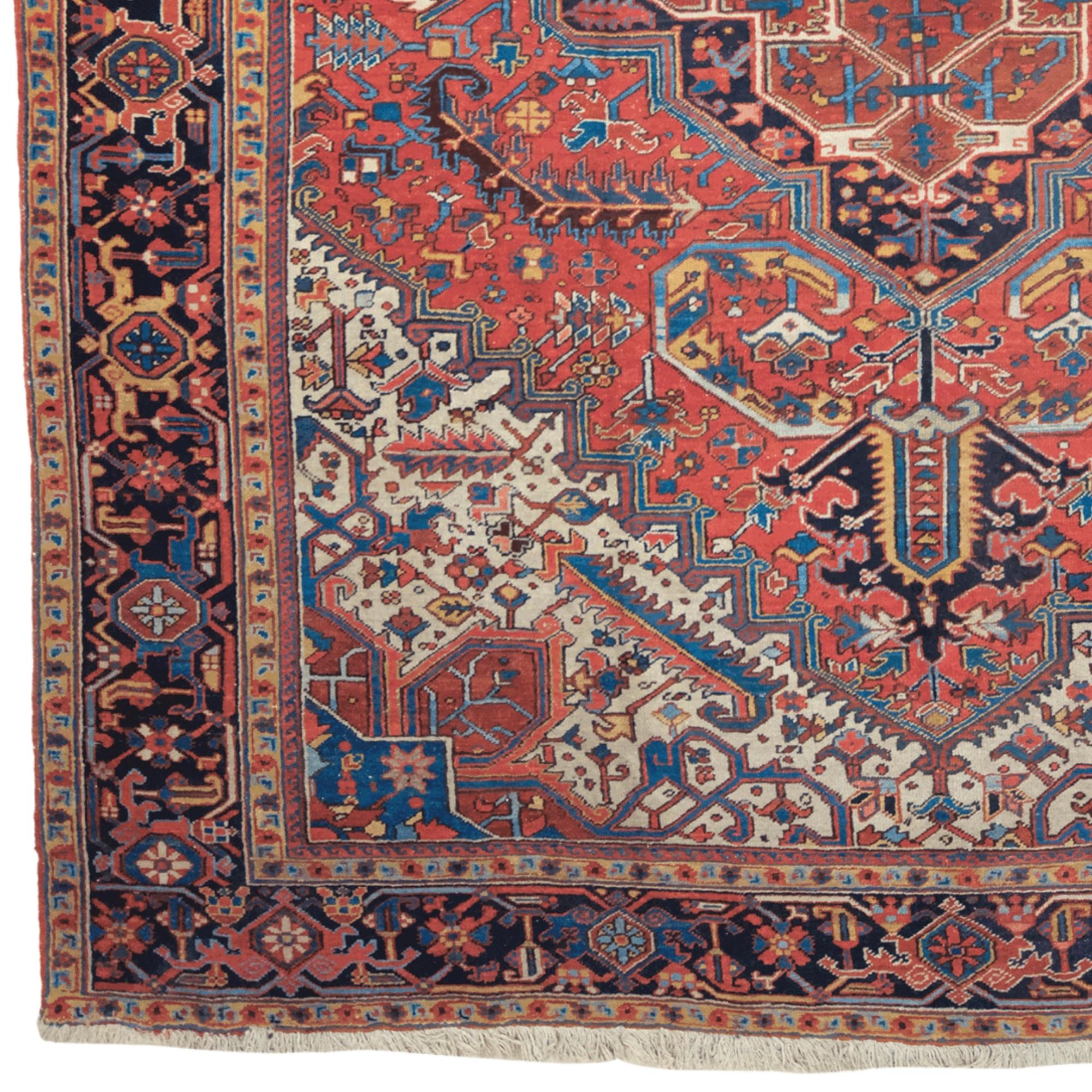 This magnificent Heriz carpet is a rare masterpiece that has survived from the late 19th century to the present day. Produced in the famous Heriz region of Iran, these carpets are known for their strong and durable structures and have unique color