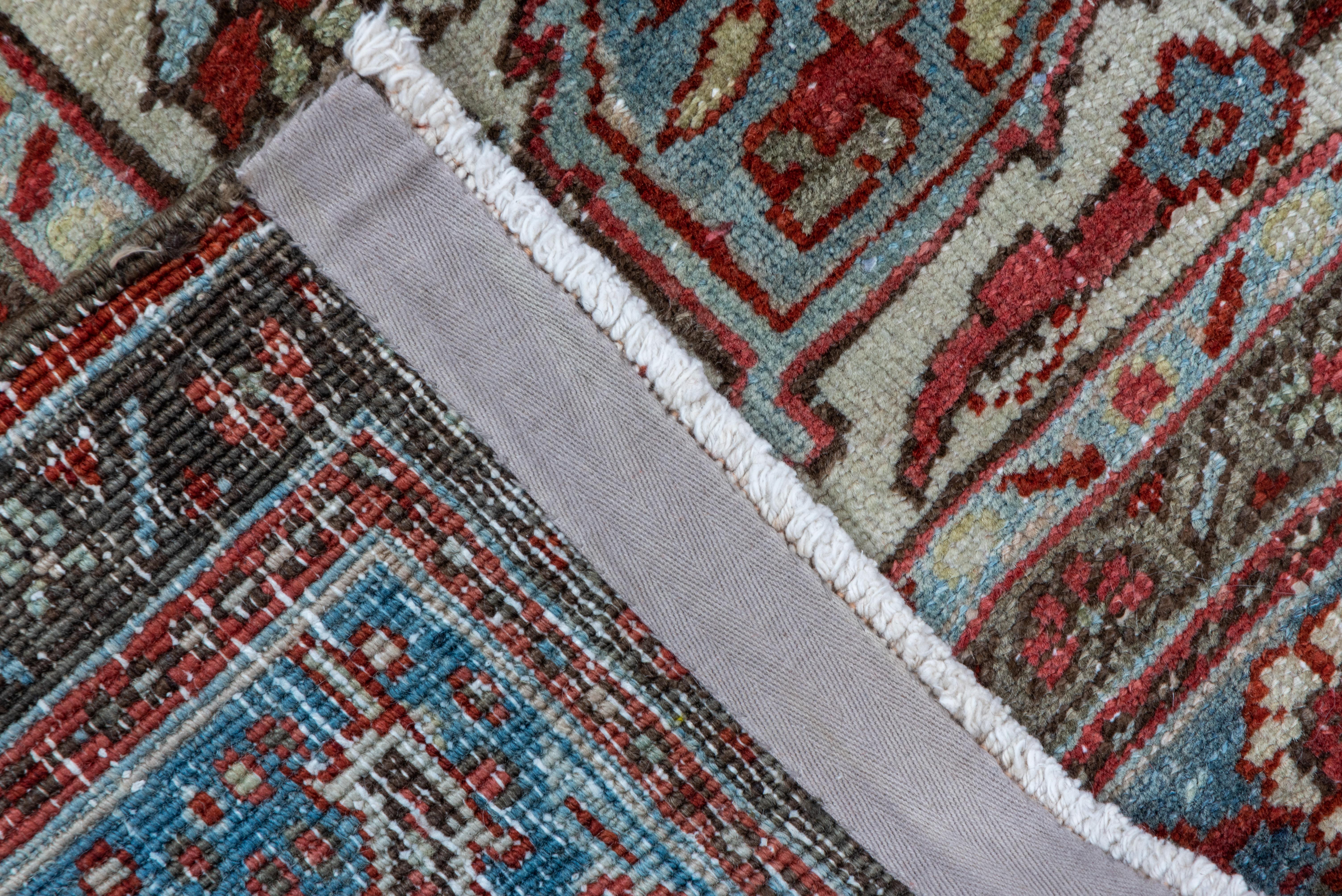 Mid-20th Century Antique Heriz Carpet, Red Field, Light Blue Medallion, Light Blue Borders For Sale