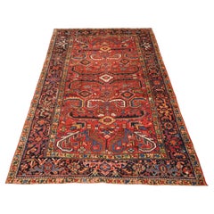 Antique Heriz carpet with a traditional all over design, circa 1910.