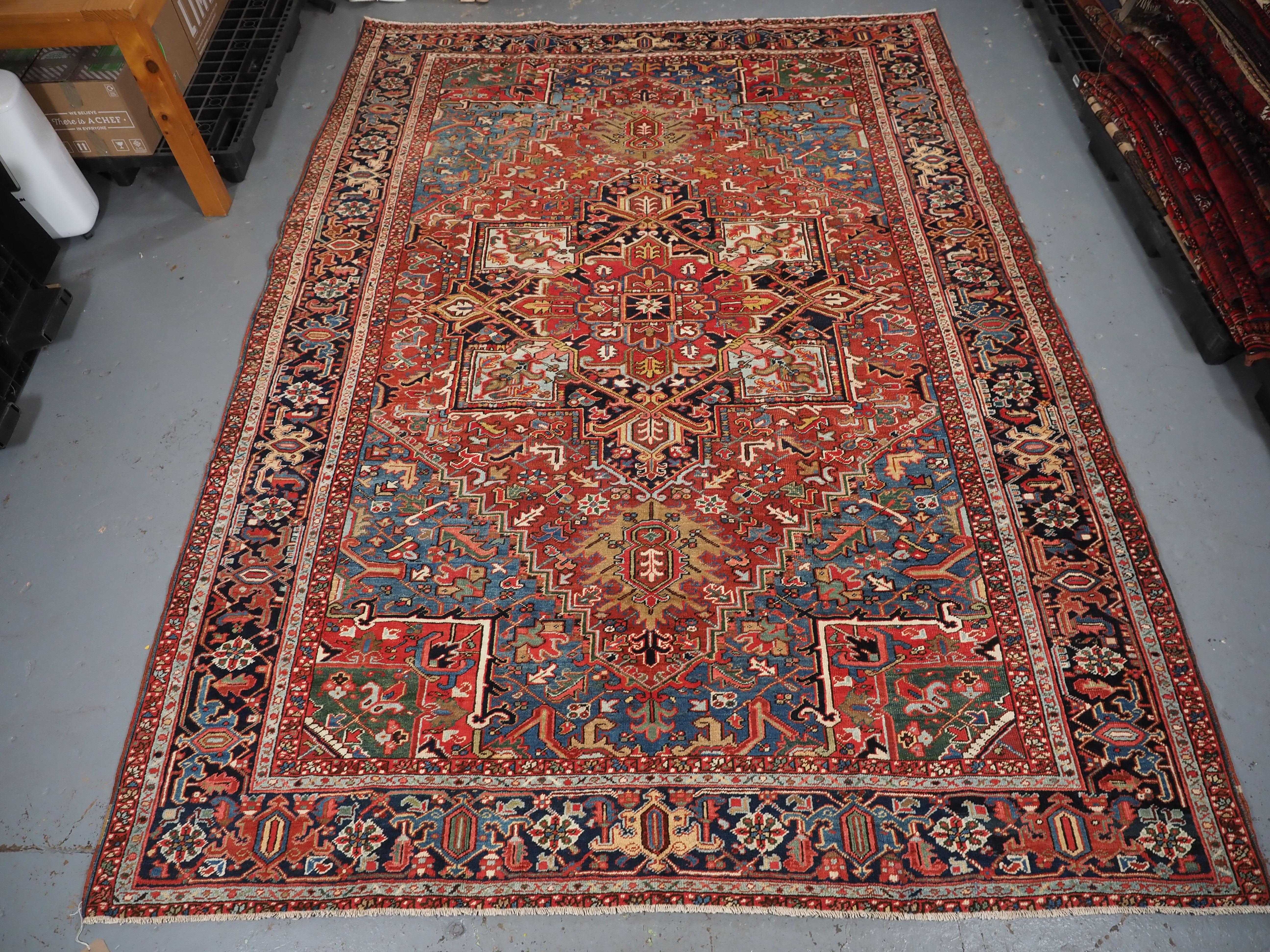 Size: 11ft 6in x 8ft 6in (351 x 259cm).

Antique Heriz carpet with a very well-drawn large medallion and excellent colours.

Circa 1900.

The carpet has a large central medallion of traditional Heriz design, the ground colour is a superb soft madder