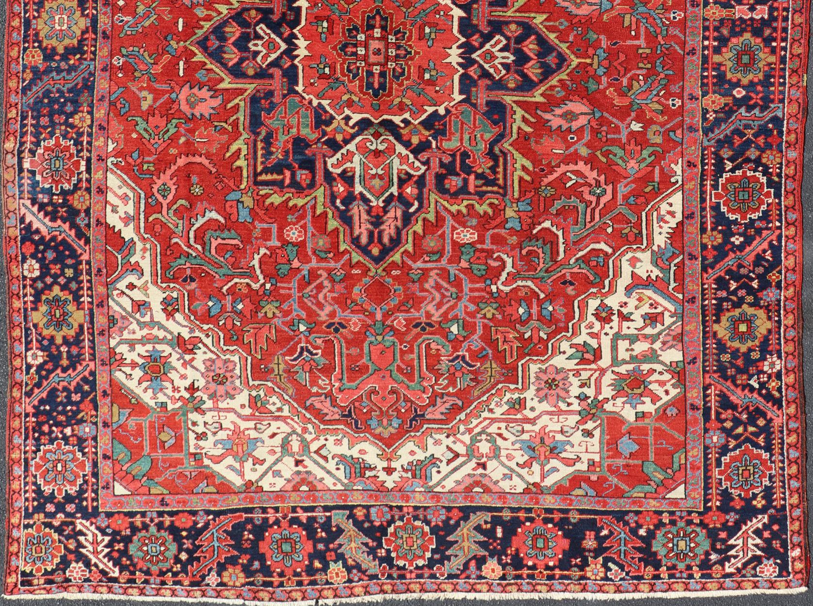 Antique Heriz Carpet with Stylized Central Medallion Set on Tomato Red Field For Sale 3