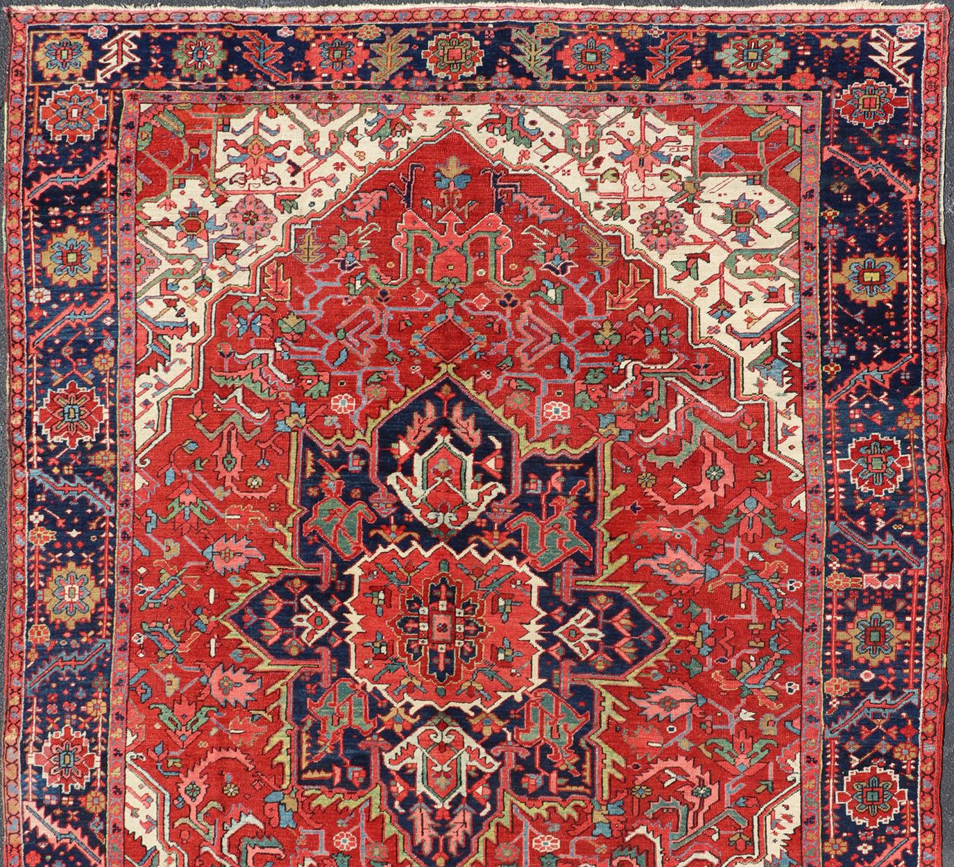 Antique Heriz Carpet with Stylized Central Medallion Set on Tomato Red Field For Sale 1