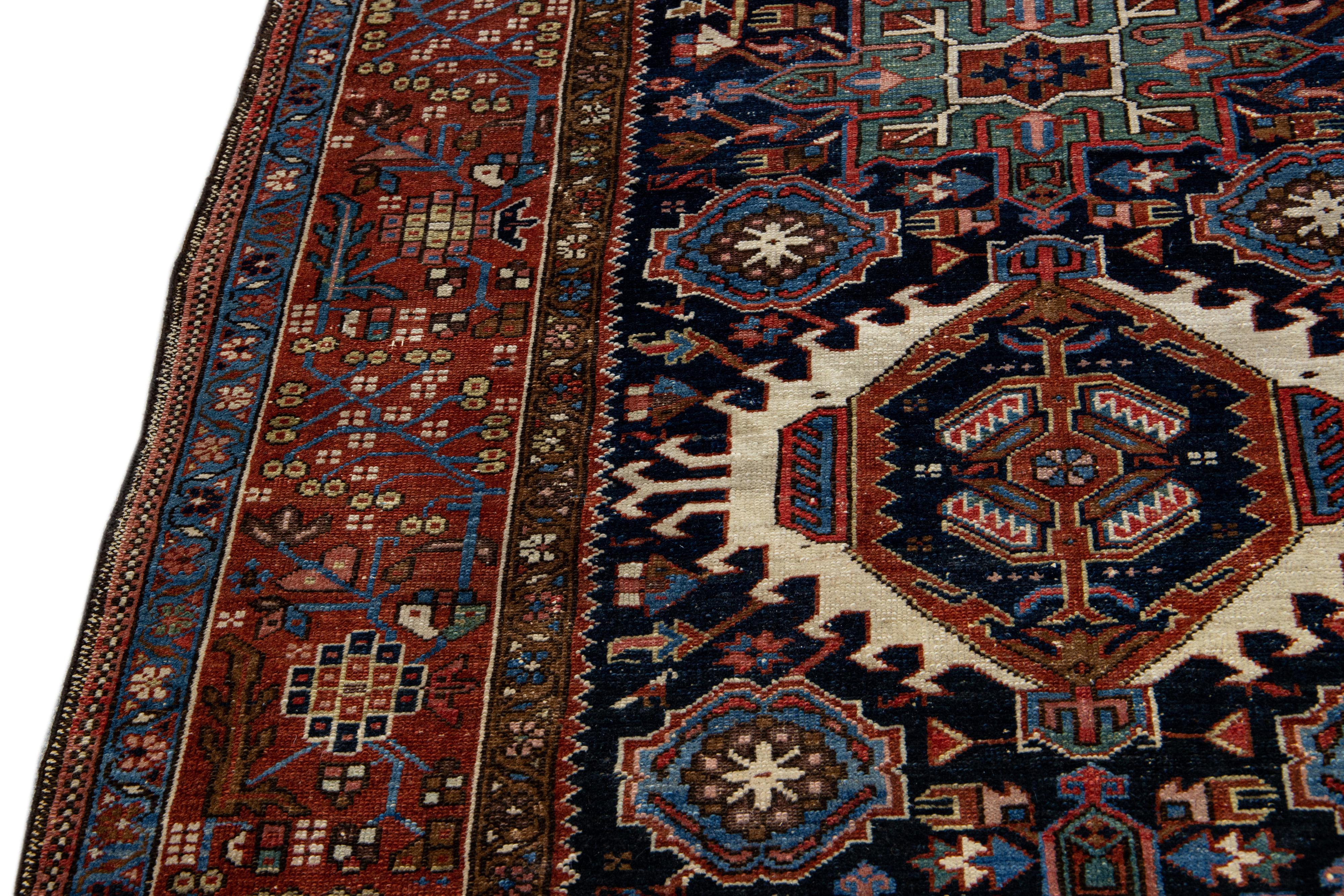 Persian Antique Heriz Handmade Medallion Blue and Red Wool Rug For Sale