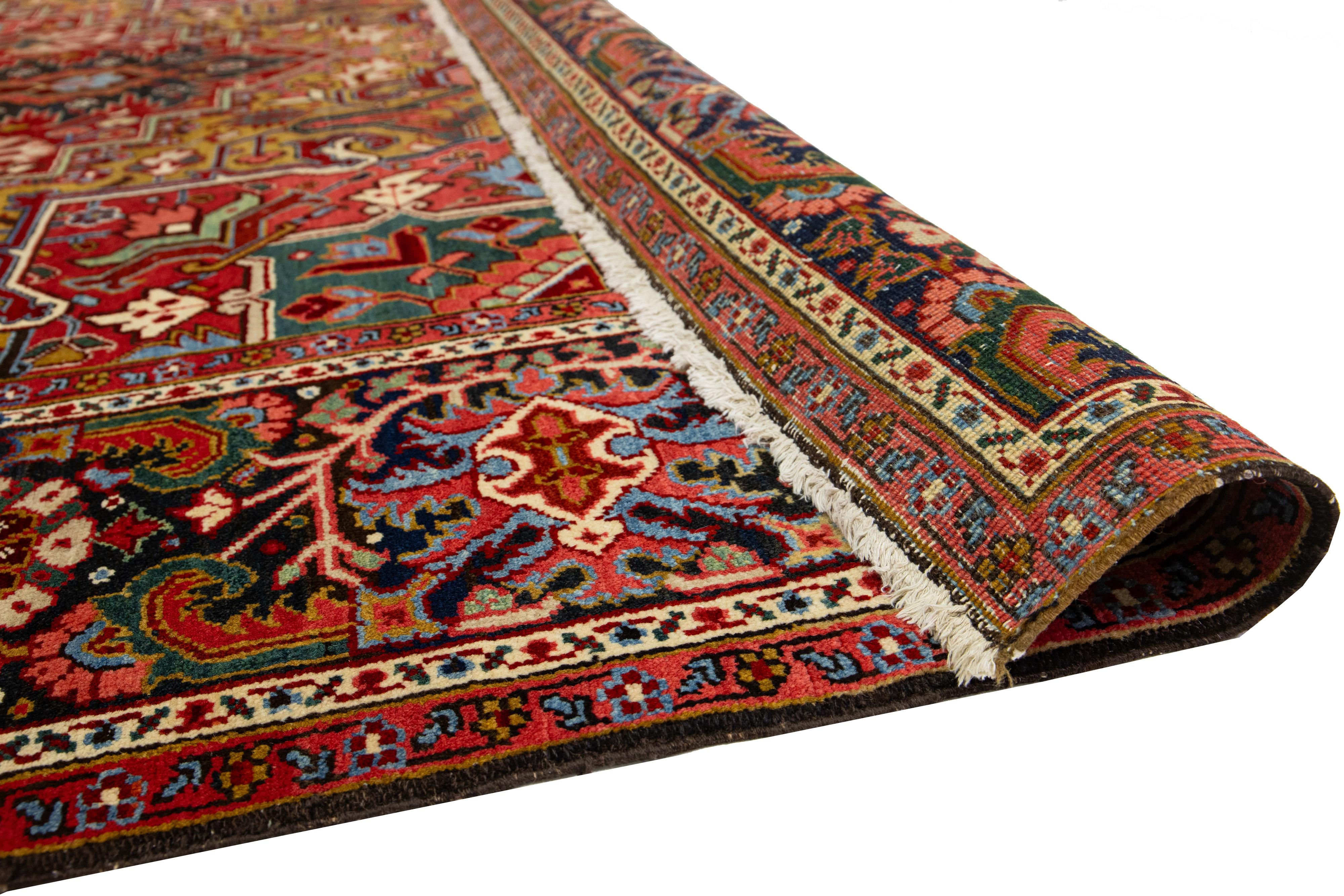 Hand-Knotted Antique Heriz Handmade Persian Medallion Designed Red Wool Rug For Sale