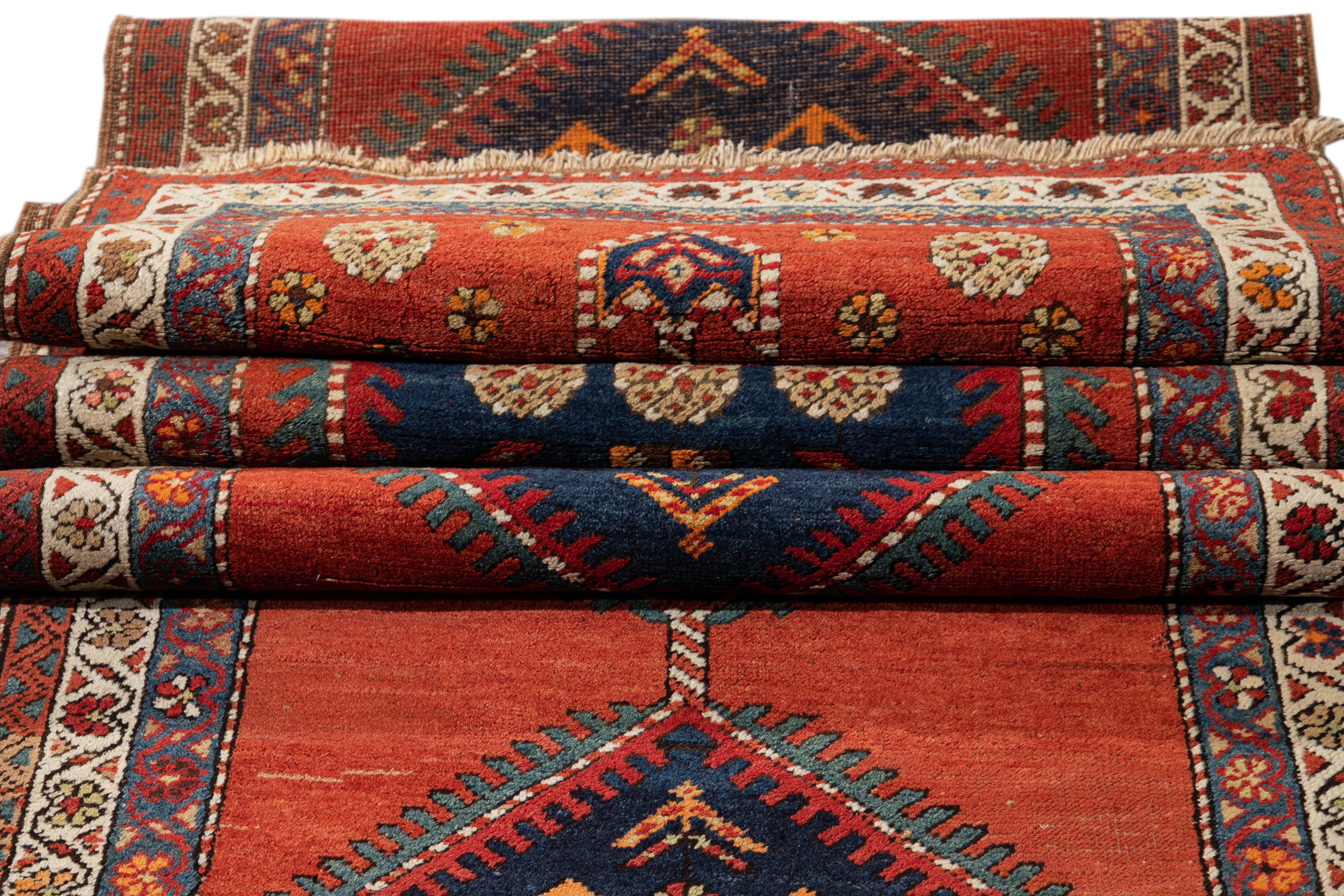 20th Century Antique Heriz Handmade Tribal Long Wool Runner With Rust-Orange Color For Sale