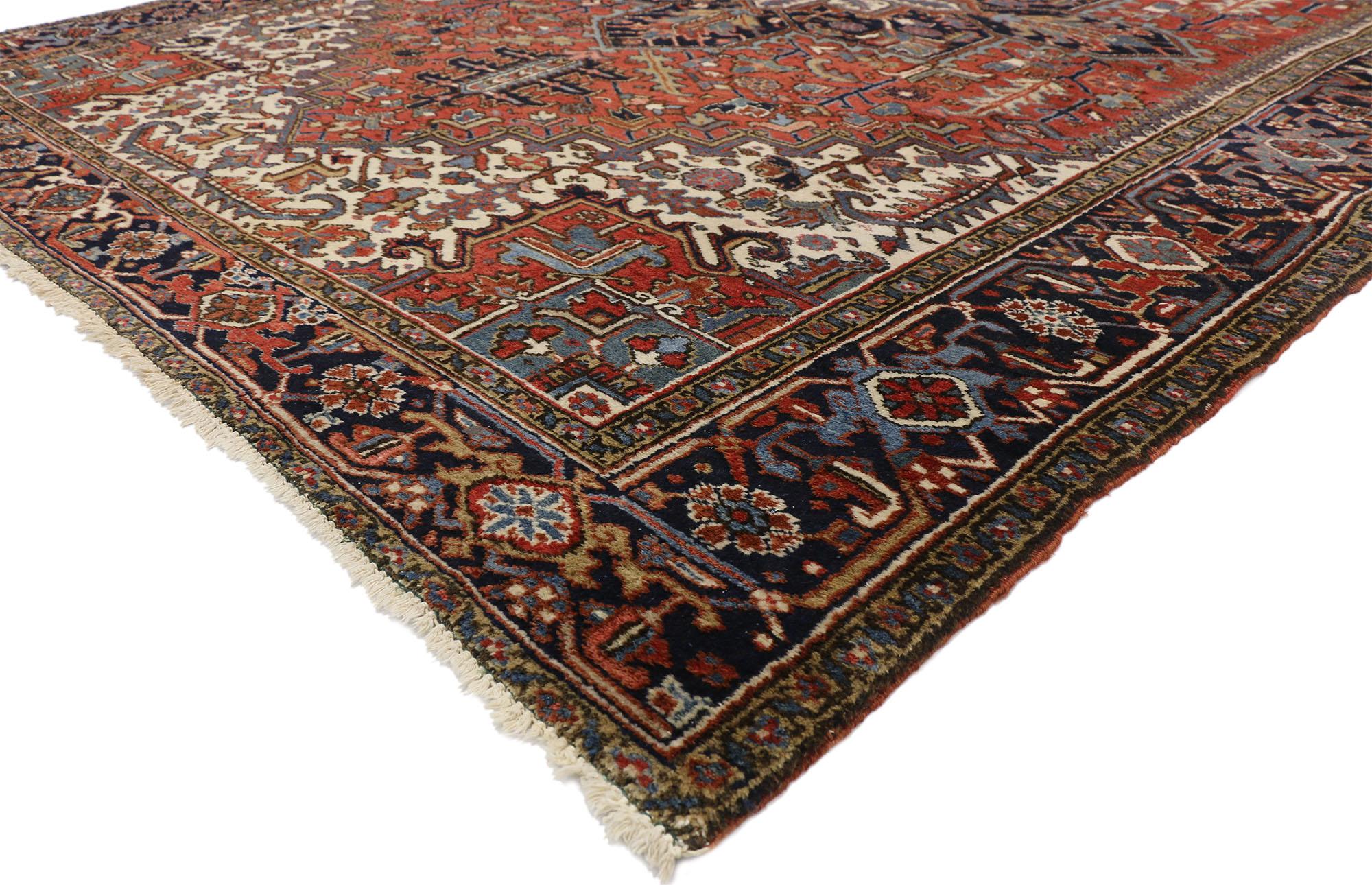 77228 Antique Heriz Persian Area Rug with Federal and American Colonial Style. Traditional and regal with brilliant color, this antique Persian Heriz area rug with American Colonial and Federal style is comprised of a prominent octagram medallion