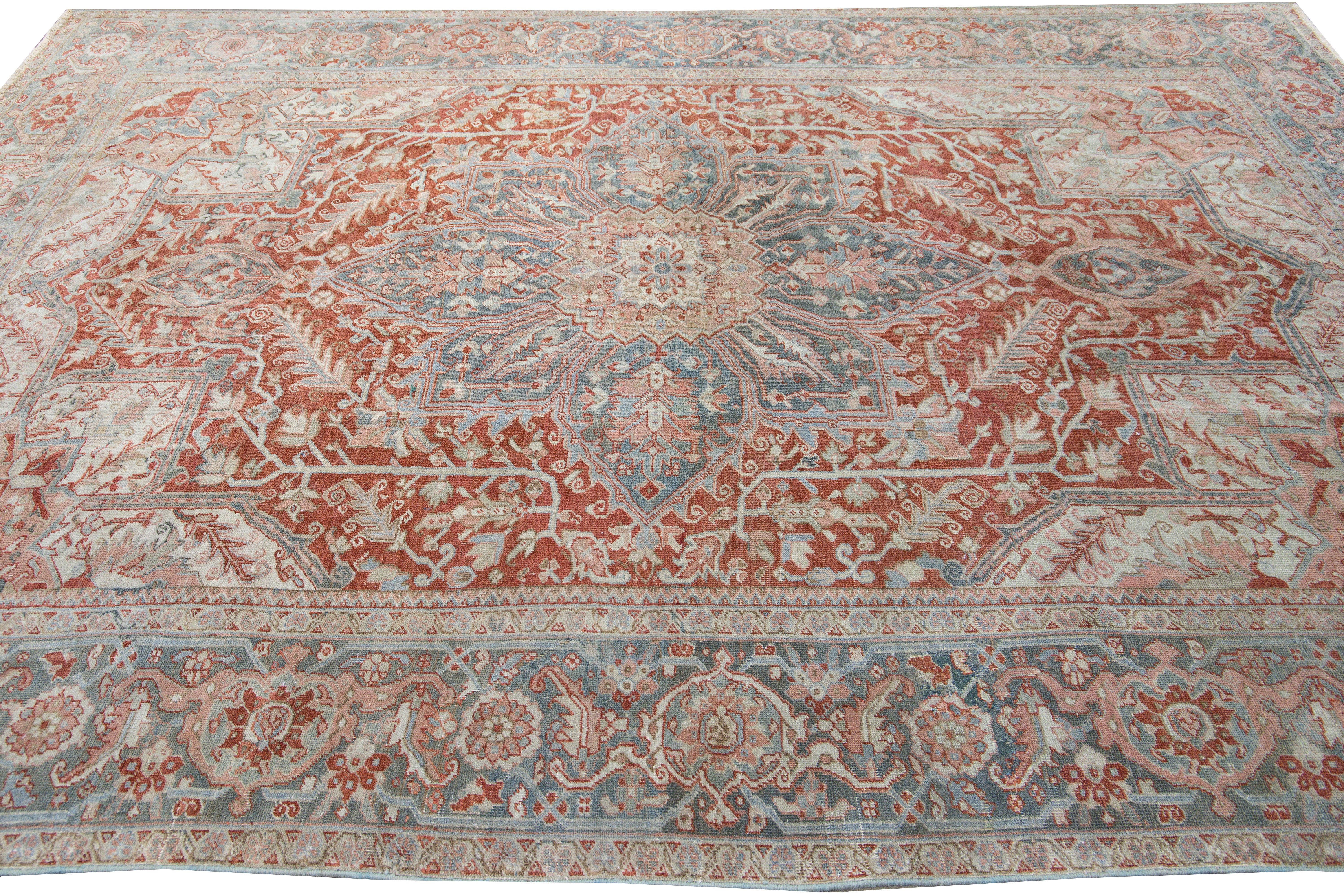 Early 20th Century Antique Heriz Persian Handmade Floral Medallion Rust Wool Rug For Sale