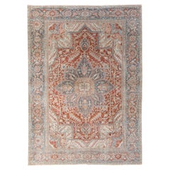 Ancien tapis persan Heriz en laine rouille à médaillons floraux fait à la main