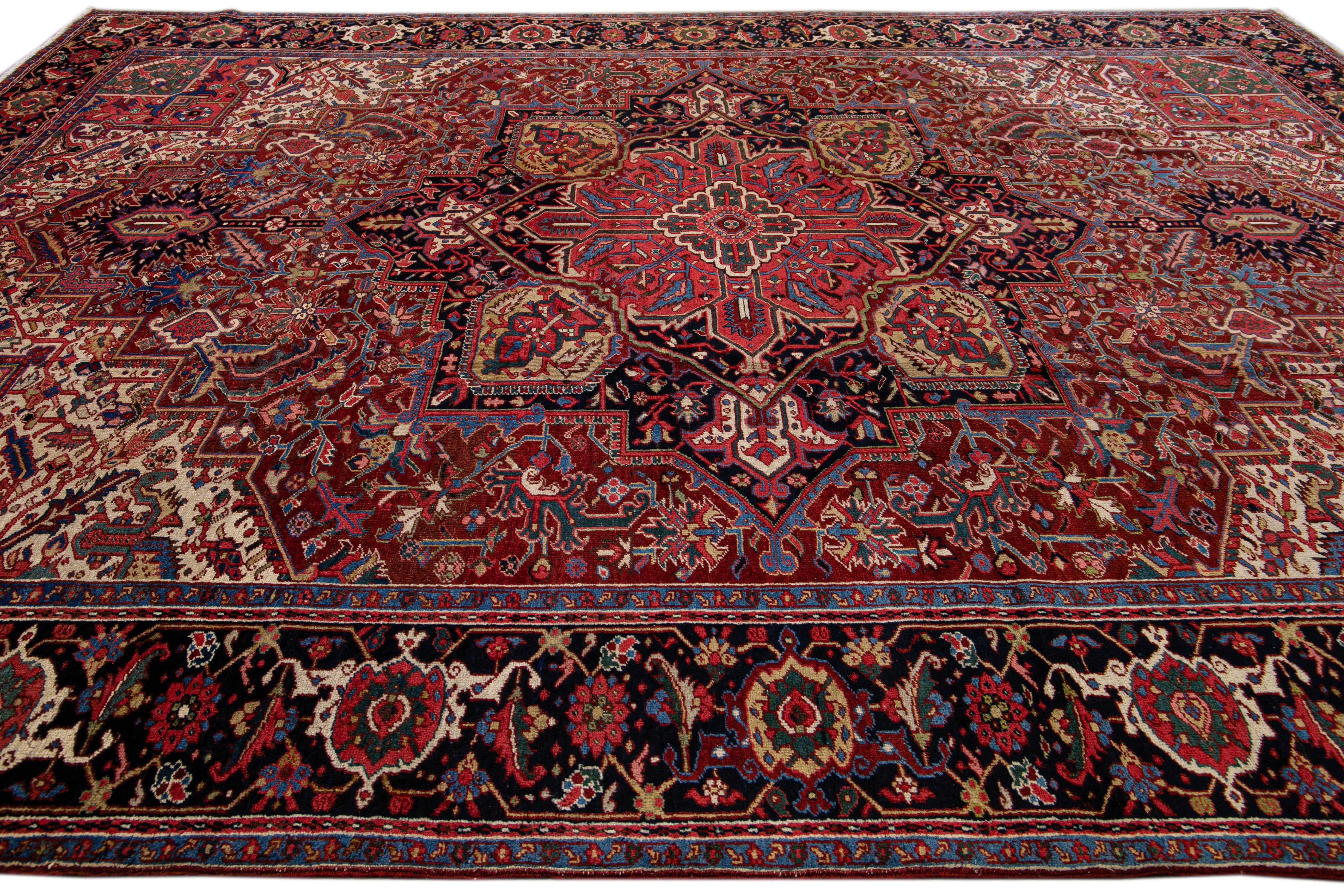 Early 20th Century Antique Heriz Persian Handmade Medallion Motif Red Wool Rug For Sale