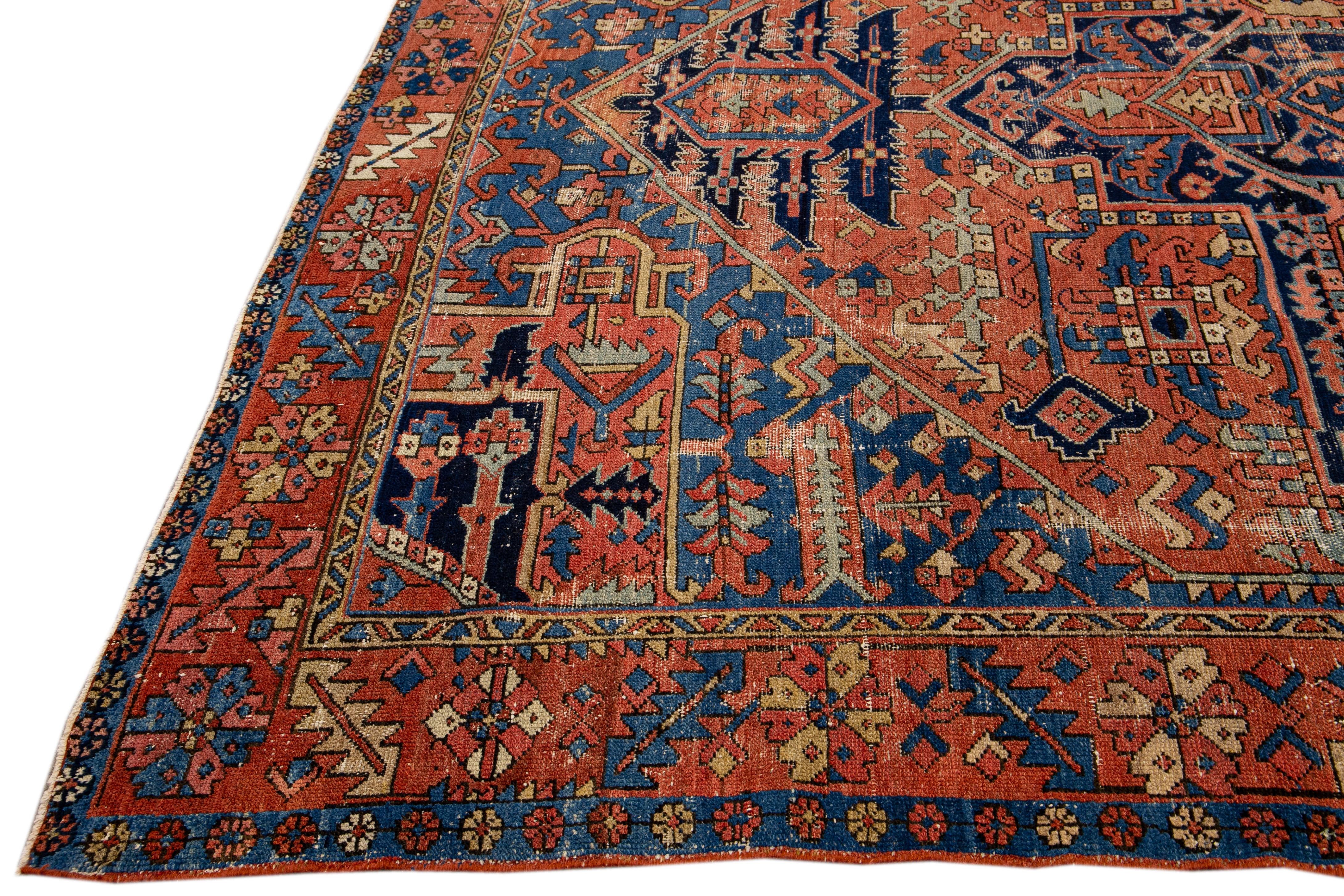 Hand-Knotted Antique Heriz Persian Handmade Medallion Motif Rusted Wool Rug For Sale