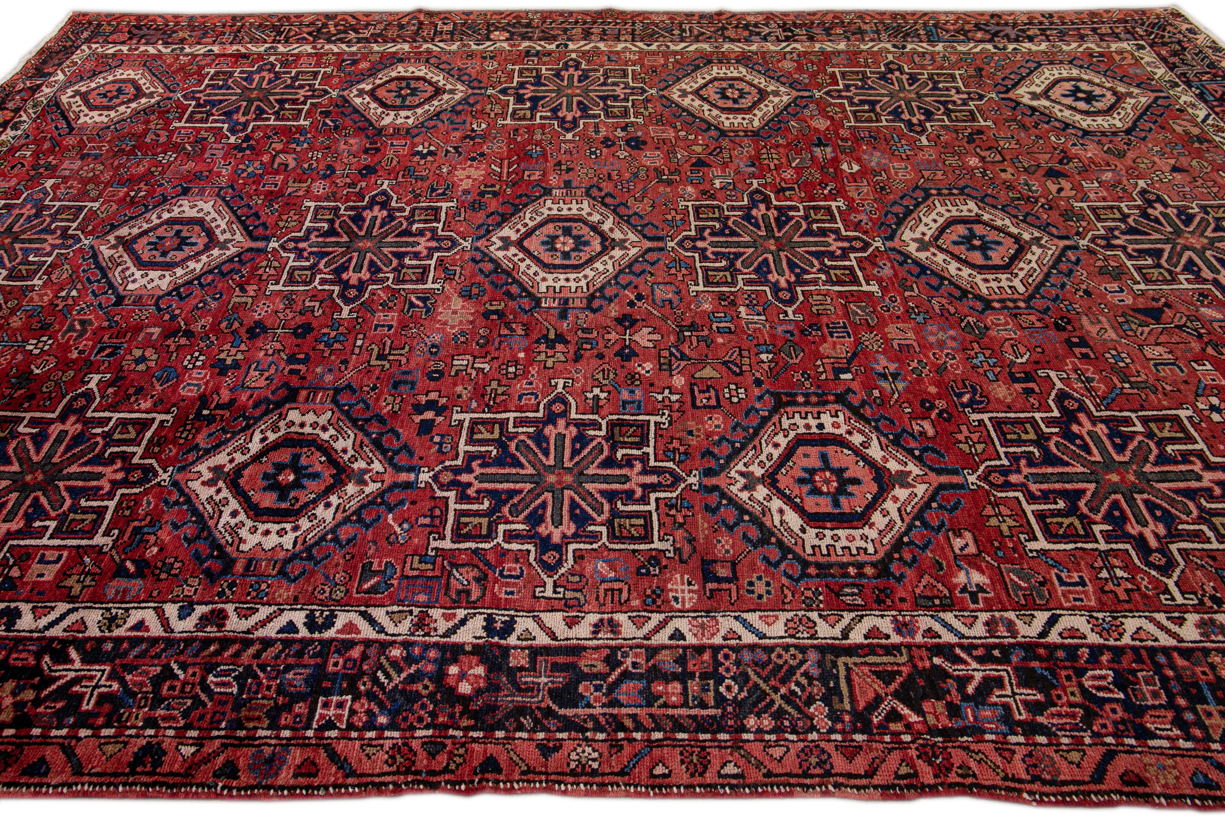 Early 20th Century Antique Heriz Persian Handmade Red Geometric Pattern Wool Rug For Sale