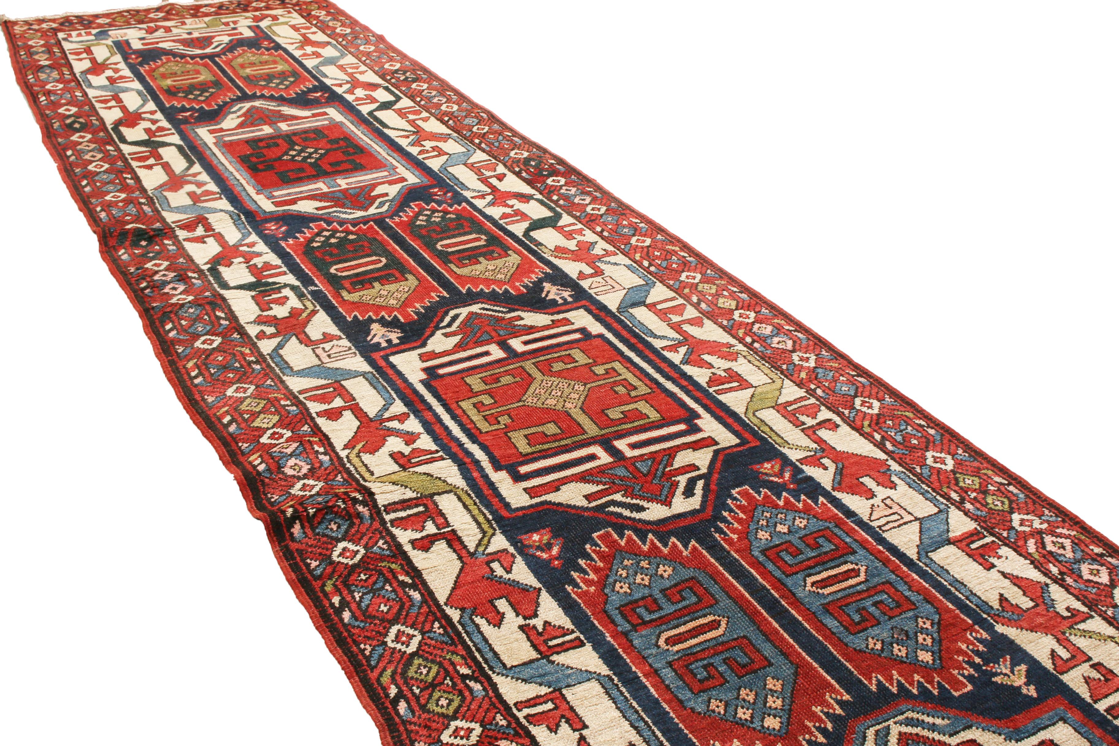 Heriz Serapi Antique Heriz Red and Blue Geometric Persian Wool Runner by Rug & Kilim For Sale