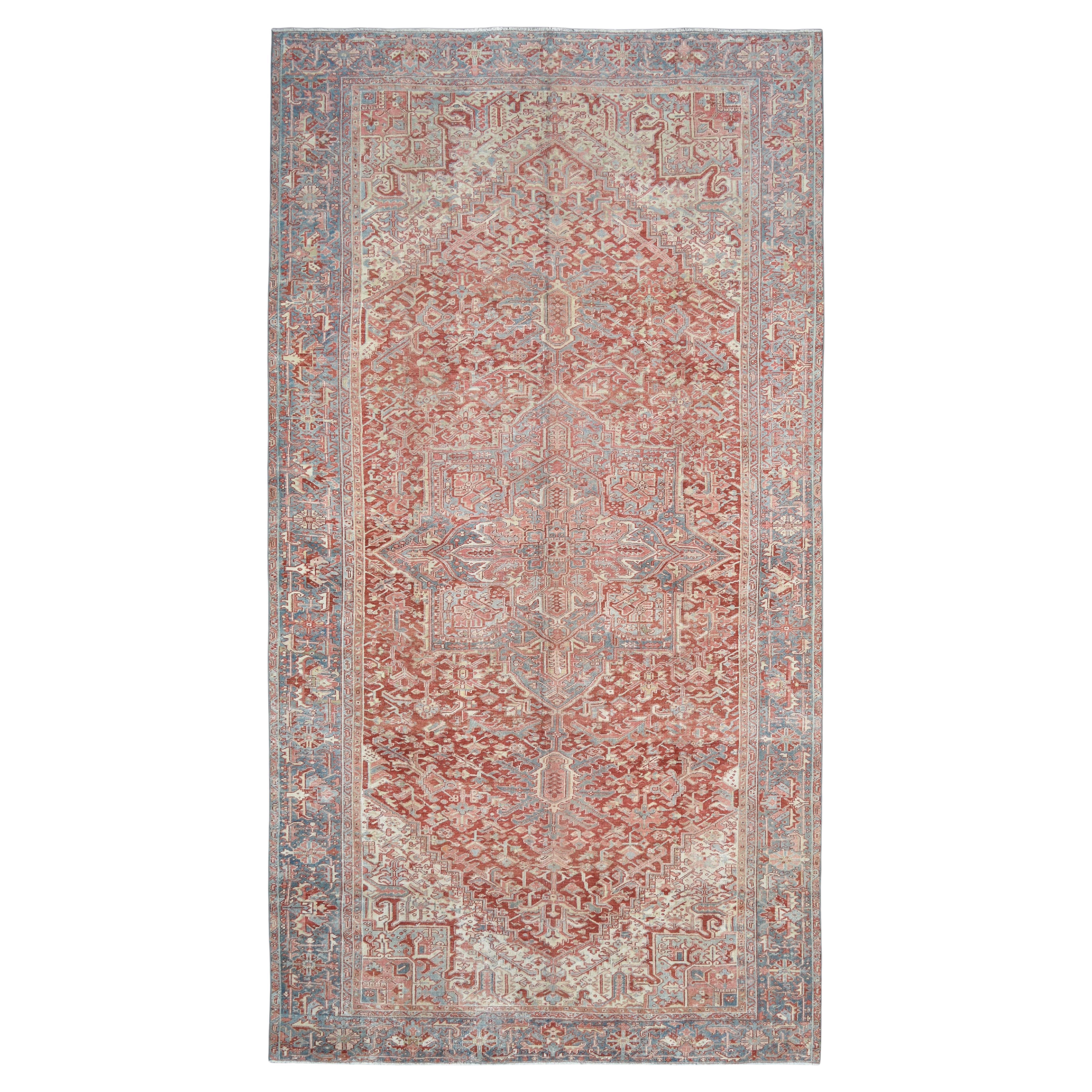 Tapis Heriz rouge et bleu 10'3''x18'10'' vers 1920