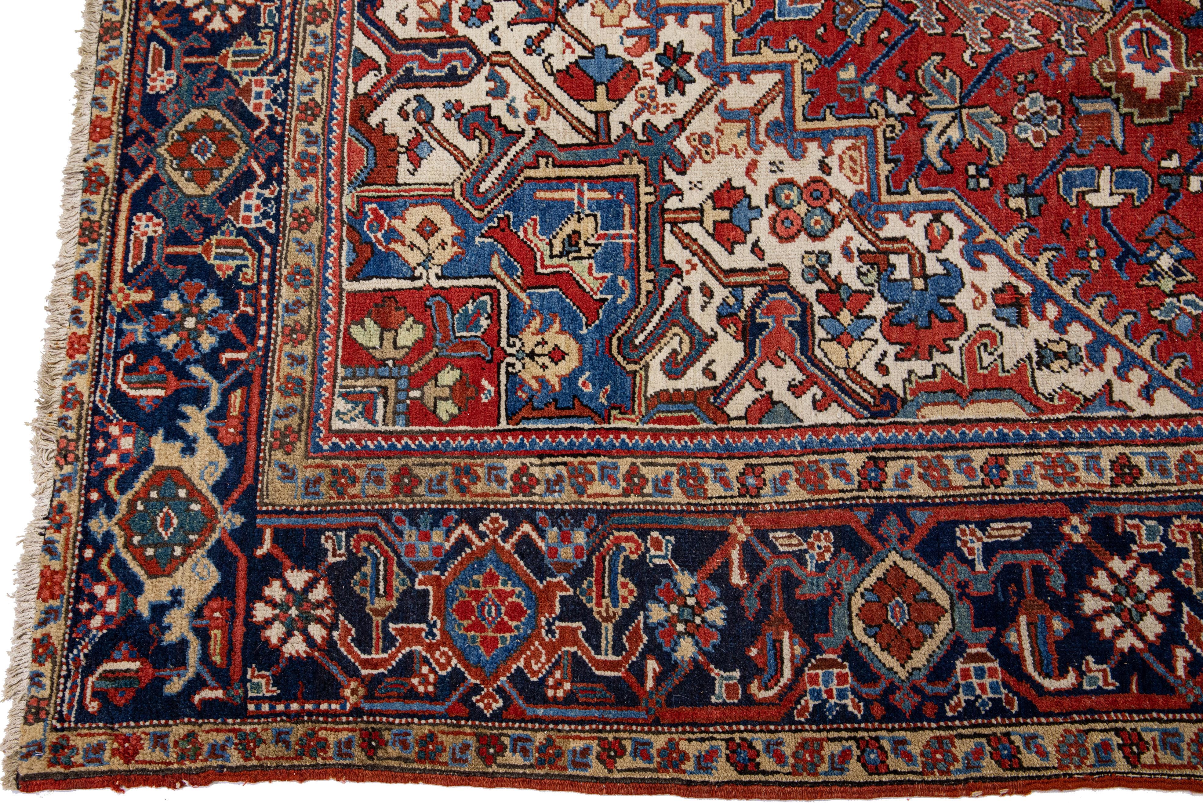 Heriz Serapi Antique Heriz Red Handmade Persian Wool Rug with Multicolor Medallion Design For Sale