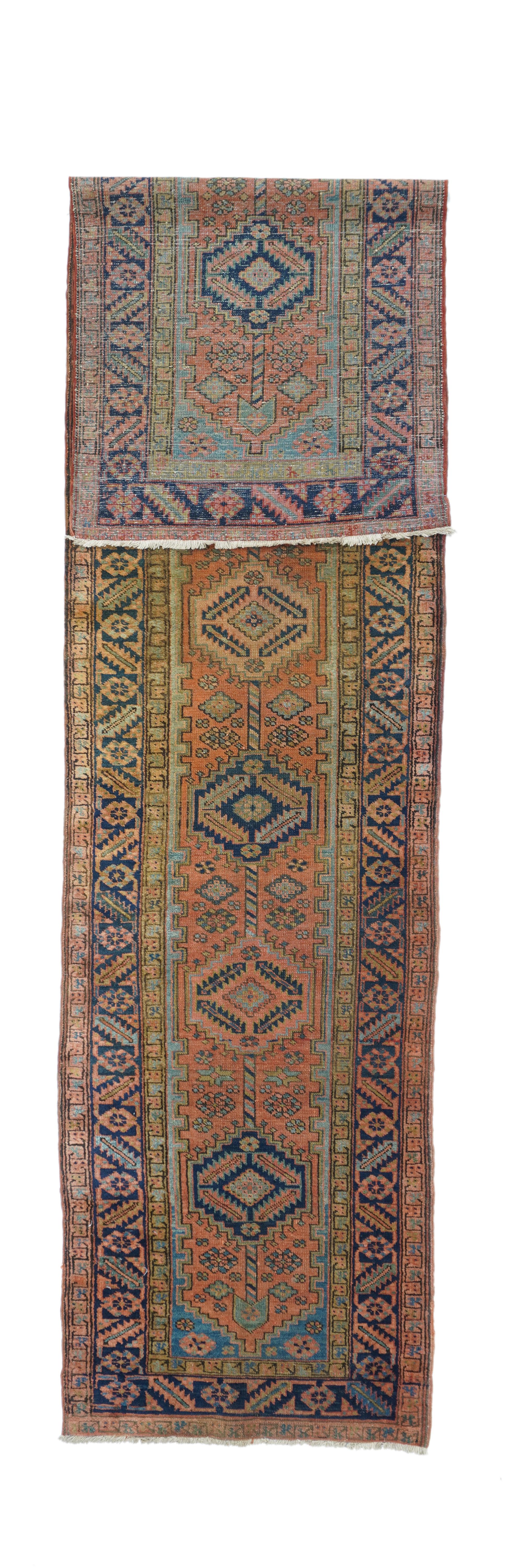 Heriz rug measures 3'0'' x 13'0''.