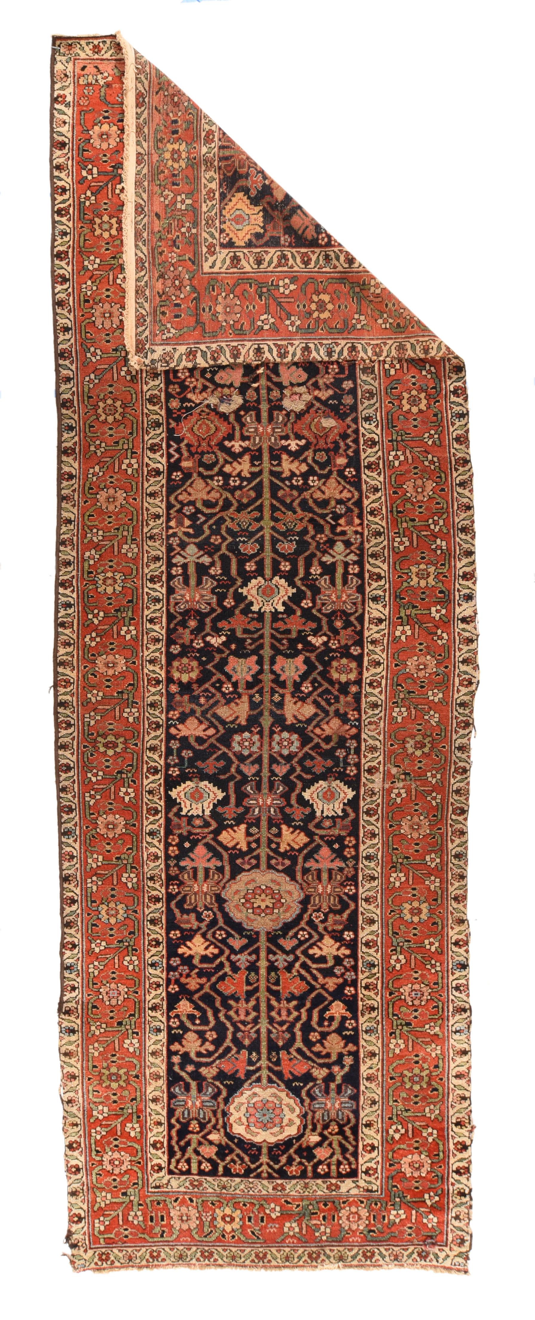 Heriz rug measures: 3'9'' x 11'5''.