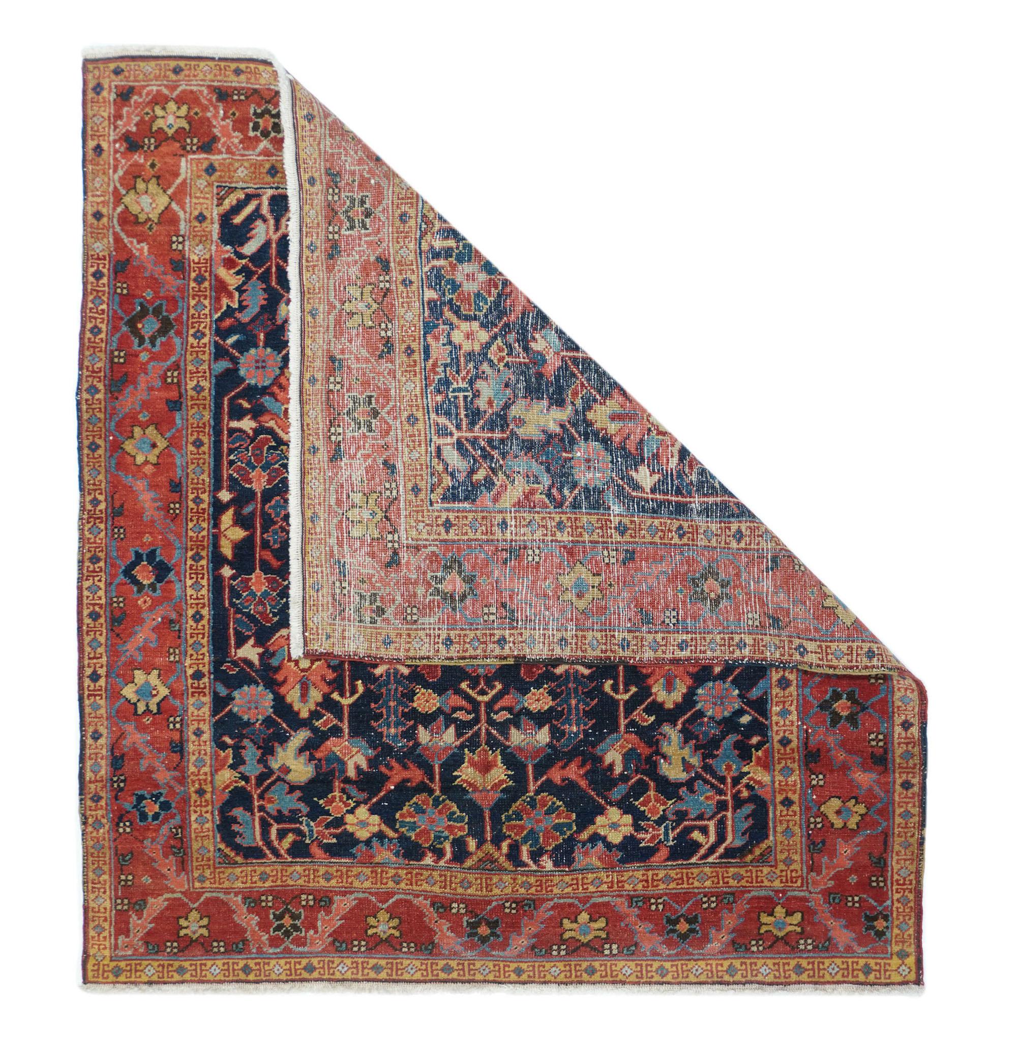Antique Heriz rug measures: 4'4'' x 5'.