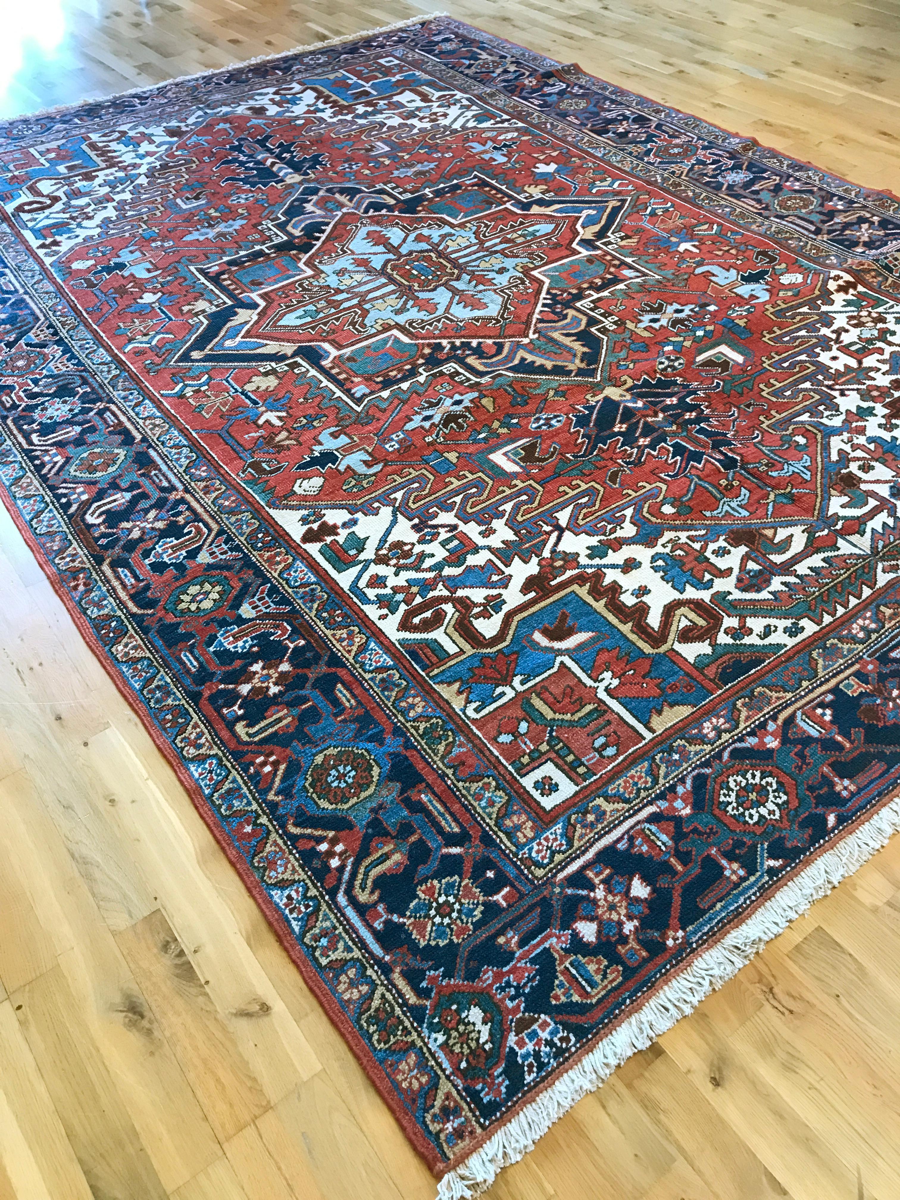 Originating in the area of Heris in northeastern Iran, the informal ‘village’ Heriz rugs are known for high-quality, durable wool, coarser knotting and warm colors. They often feature bold, geometric patterns with large medallions but can also be