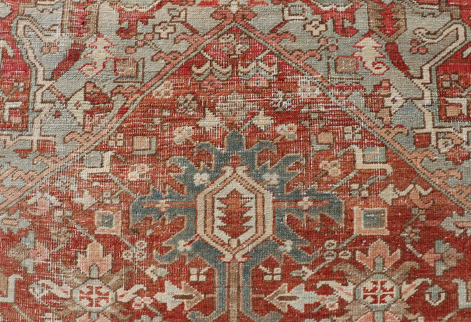 Antique Heriz Rug with All-Over Medallion Design in Red, Blue, Pink, Tan & Brown For Sale 2