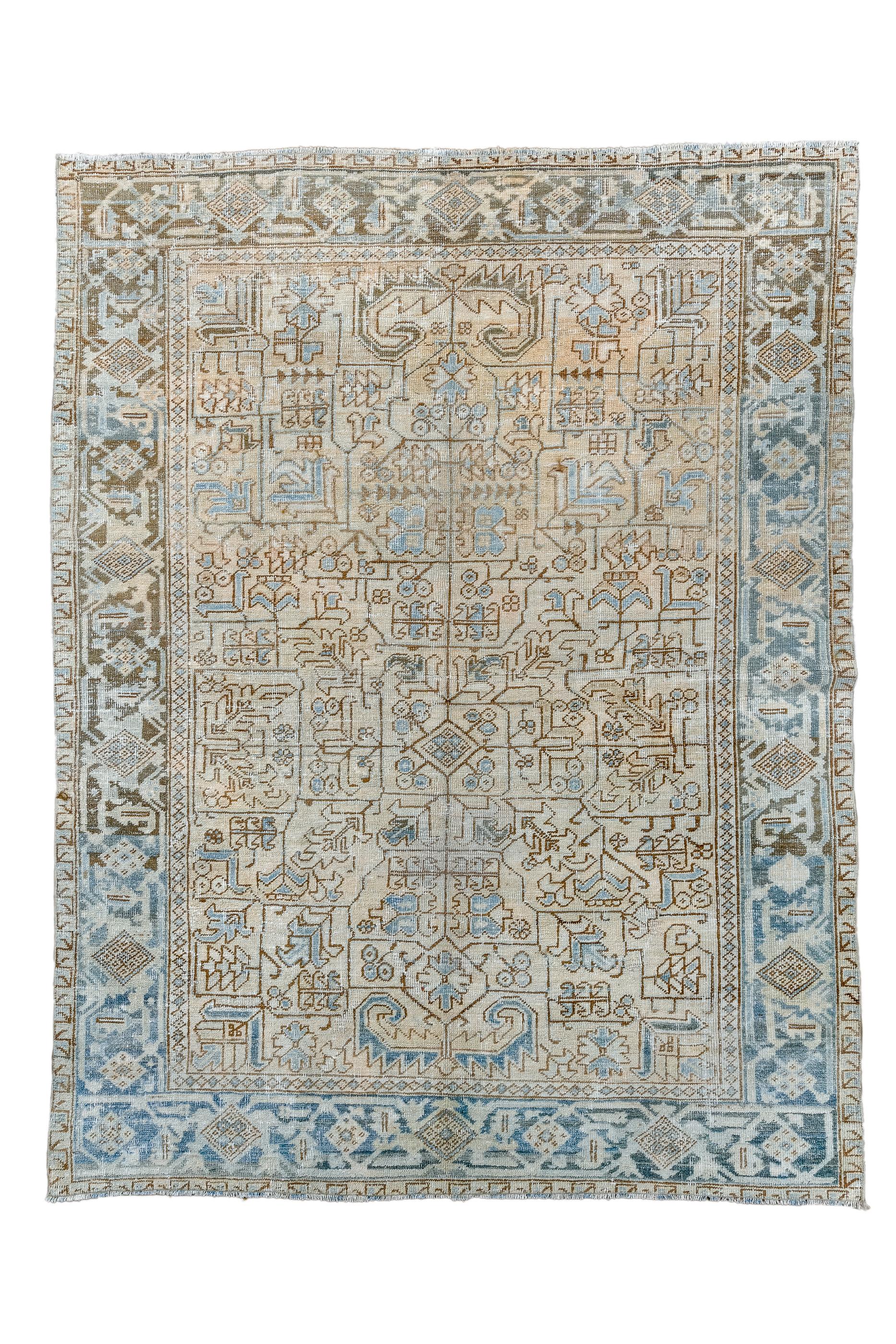 The straw-beige field shows an orthogonal wiry pattern of stylized palmettes, formal flowers and stiff vinery, within a strip style turtle border panel abrashing between slate and brick.  The wiry arabesque is executed in a similar brick.

Rug