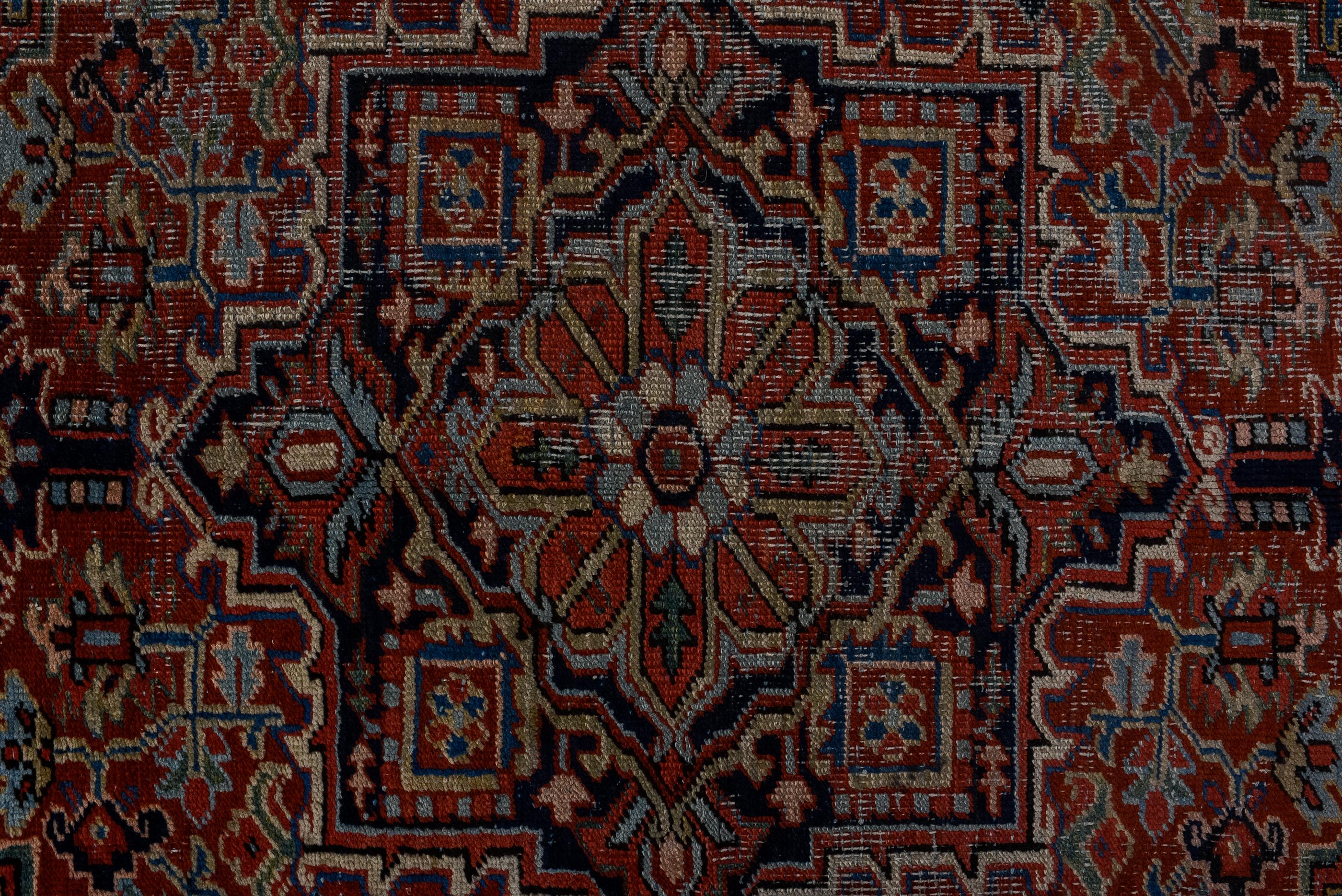 Hand-Knotted Antique Heriz Rug with Red Field and blue Medallion  For Sale