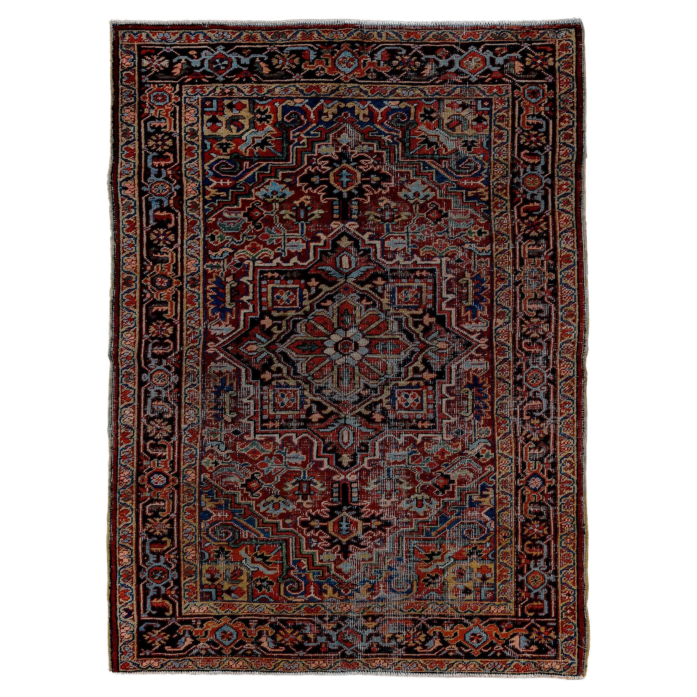 Antique Heriz Rug with Red Field and blue Medallion  For Sale