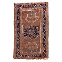 Antique Heriz Rug with Warm Red Field and Dark Blue Border