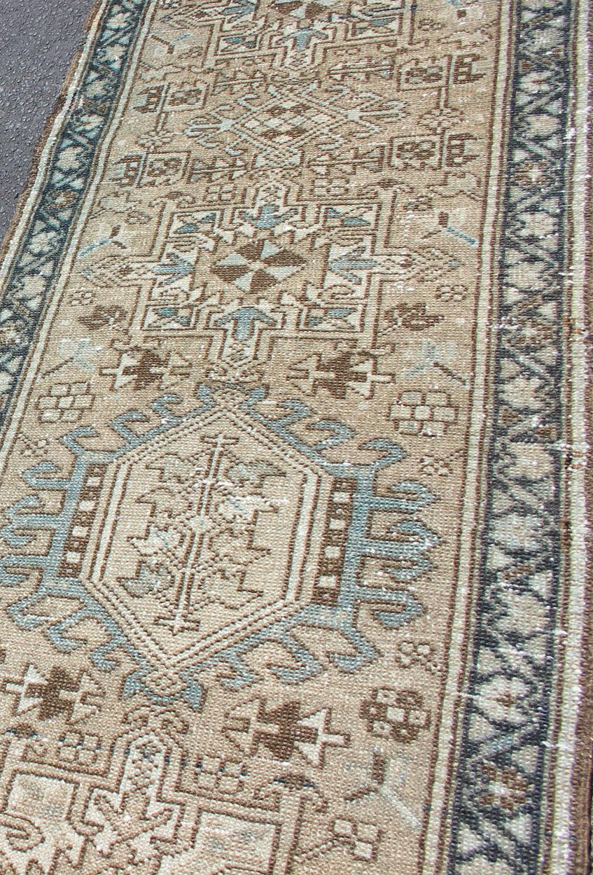 Mid-20th Century Antique Heriz Runner with Geometric Central Medallions in Tan, Blue & Brown For Sale