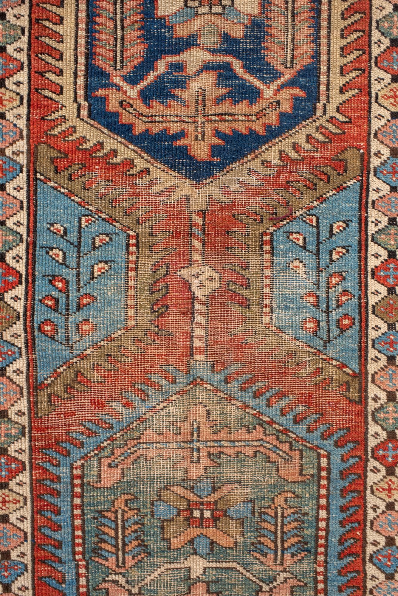 Hand-Knotted Antique Heriz Runner with Hexagonal Medallions in Red and Blue For Sale