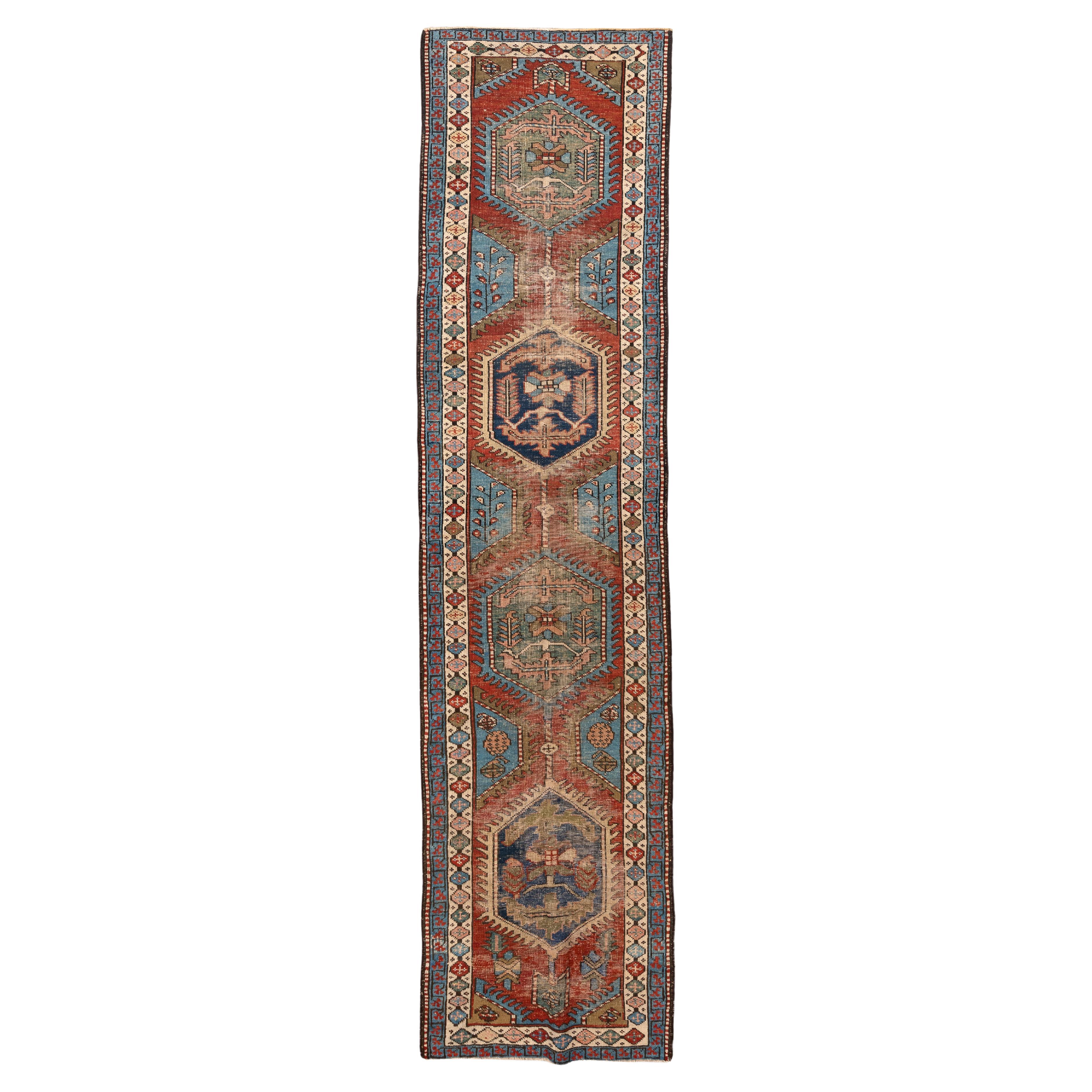 Antique Heriz Runner with Hexagonal Medallions in Red and Blue For Sale