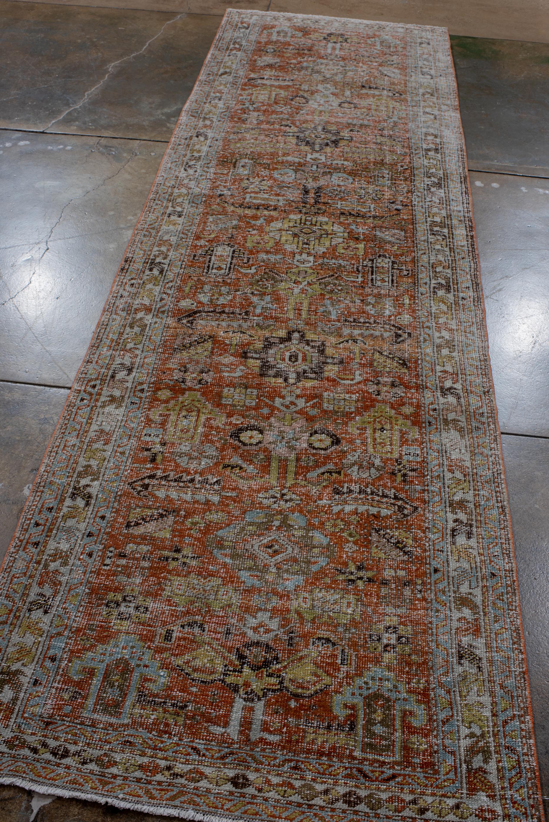 Persian Antique Heriz Runner with Scattered Medallion For Sale