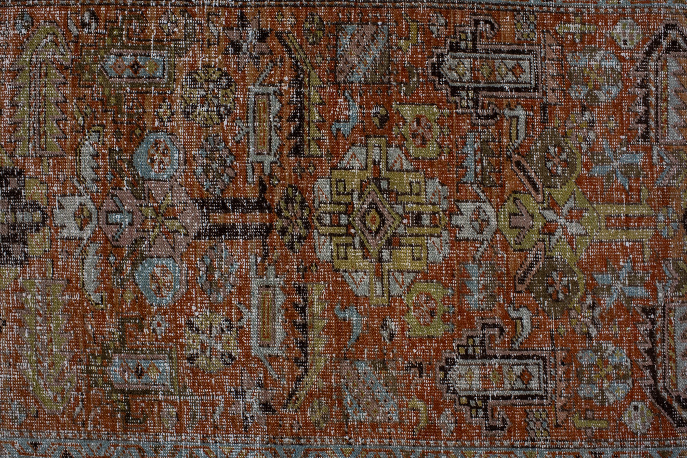 Hand-Knotted Antique Heriz Runner with Scattered Medallion For Sale