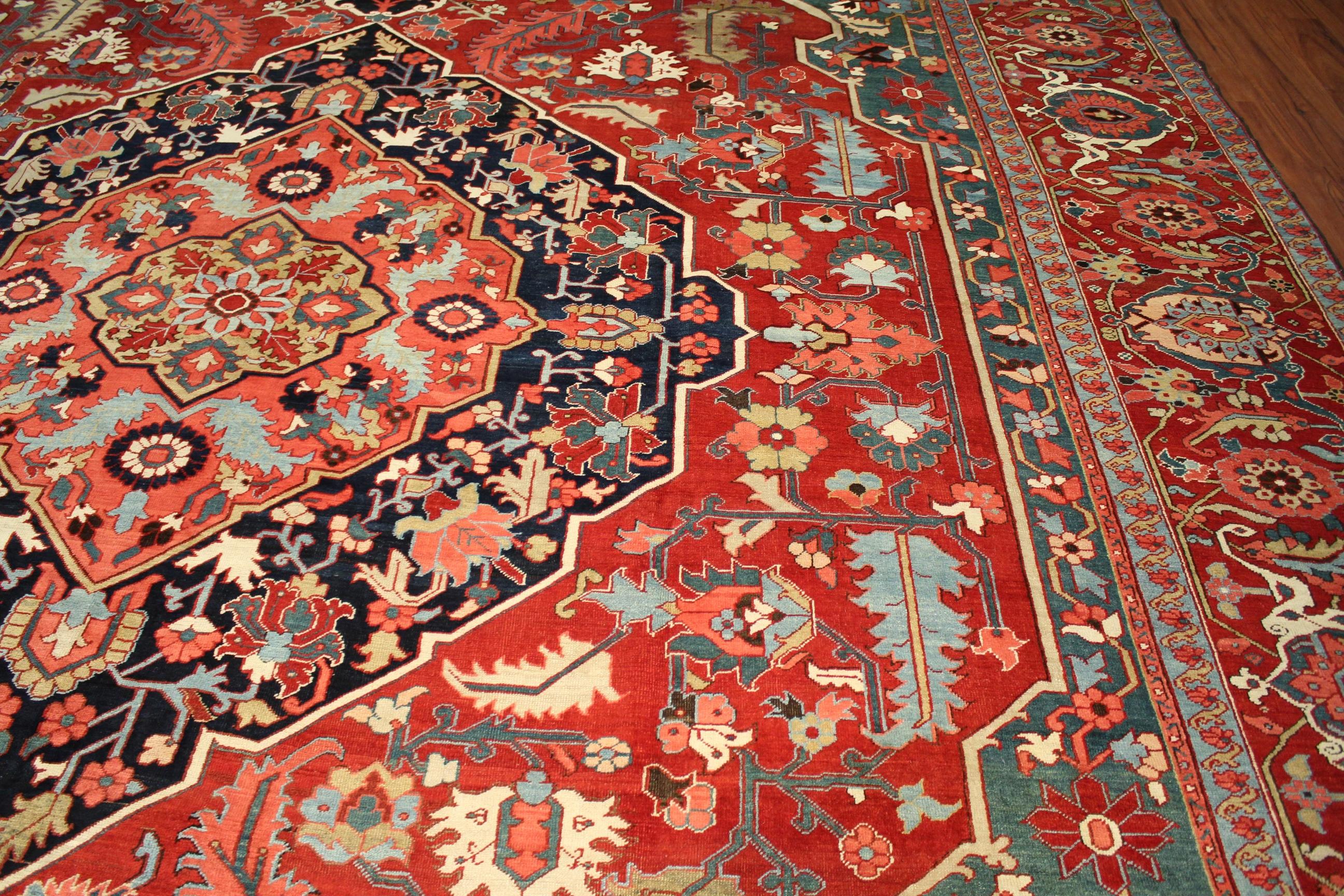 This is a beautiful Heriz Serapi antique Rug/Carpet that was hand-knotted in the early 1900s. This rug is in excellent condition and has had minor repairs (Ends and sides). Also minor refinishing after cleaning. All professionally done and handled