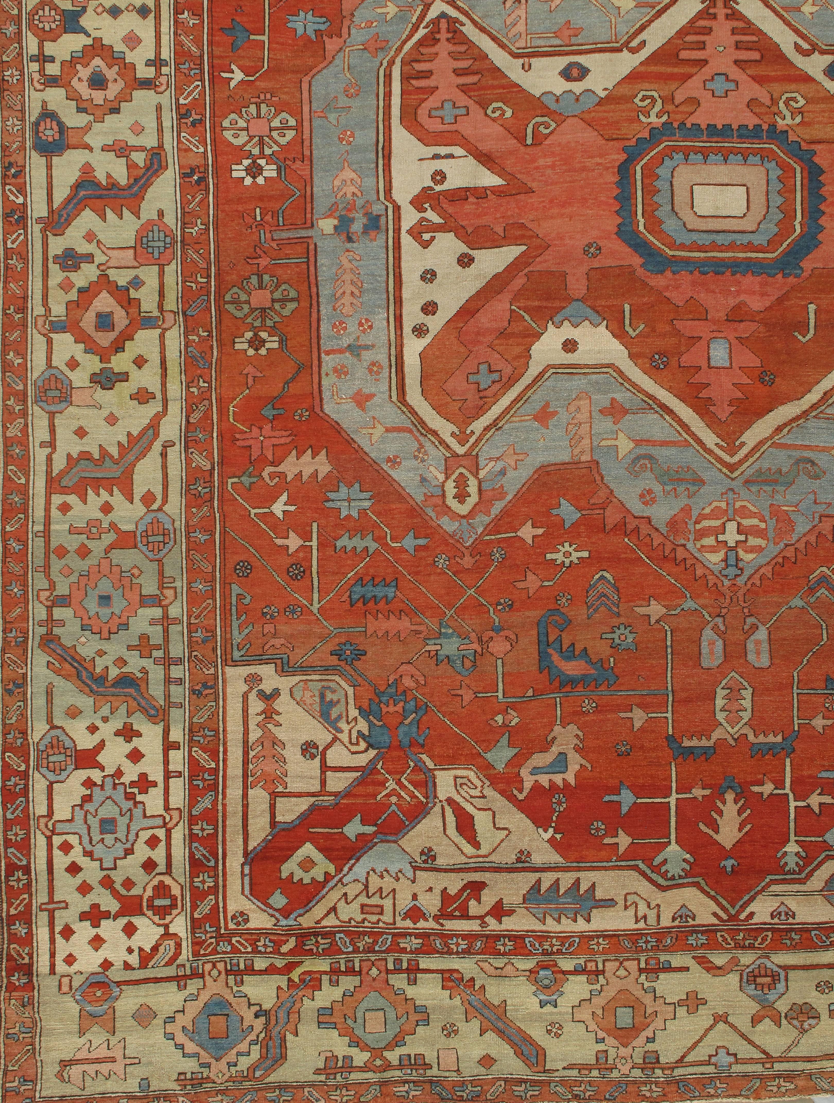 Antique Heriz Serapi rug, circa 1890, 11'5 x 14'4. This carpet is a Fine example of the eccentric and imaginative Serapi quality Heriz carpets woven at the end of the 19th century. The attractive madder red field has lobate corner extensions and