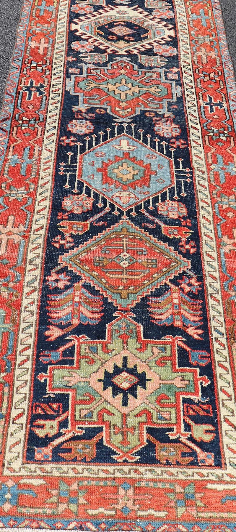 Antique Heriz Serapi Runner with Colorful Highly Stylized Medallion Design. Keivan Woven Arts / rug/EMB-22148-15080, origin/iran Heriz-Serapi / Early 20th Century.
Measures: 3'1 x 13'9 

This magnificent Heriz runner from the early 20th century
